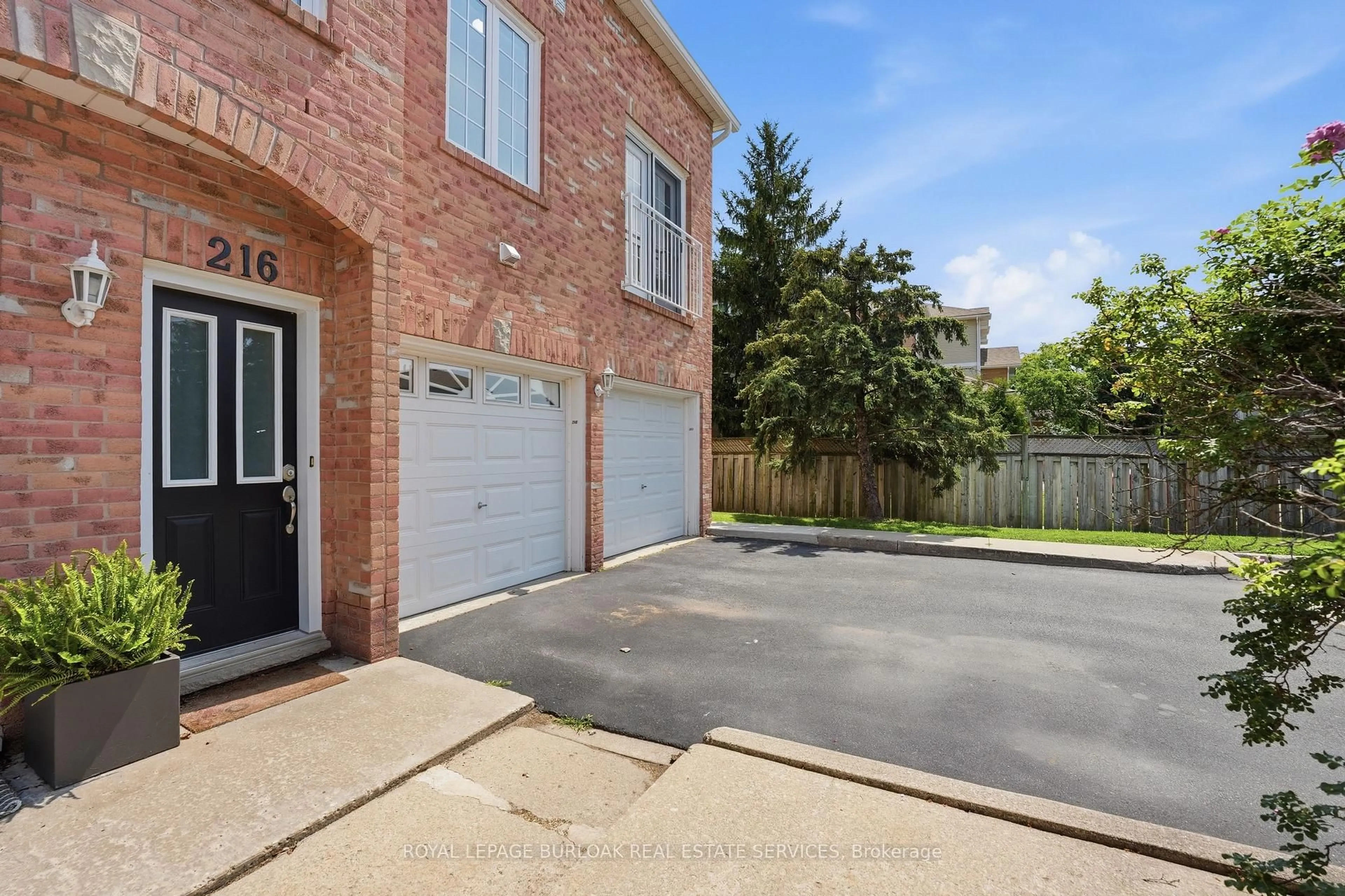 A pic from outside/outdoor area/front of a property/back of a property/a pic from drone, street for 2055 Walkers Line #216, Burlington Ontario L7M 4B5