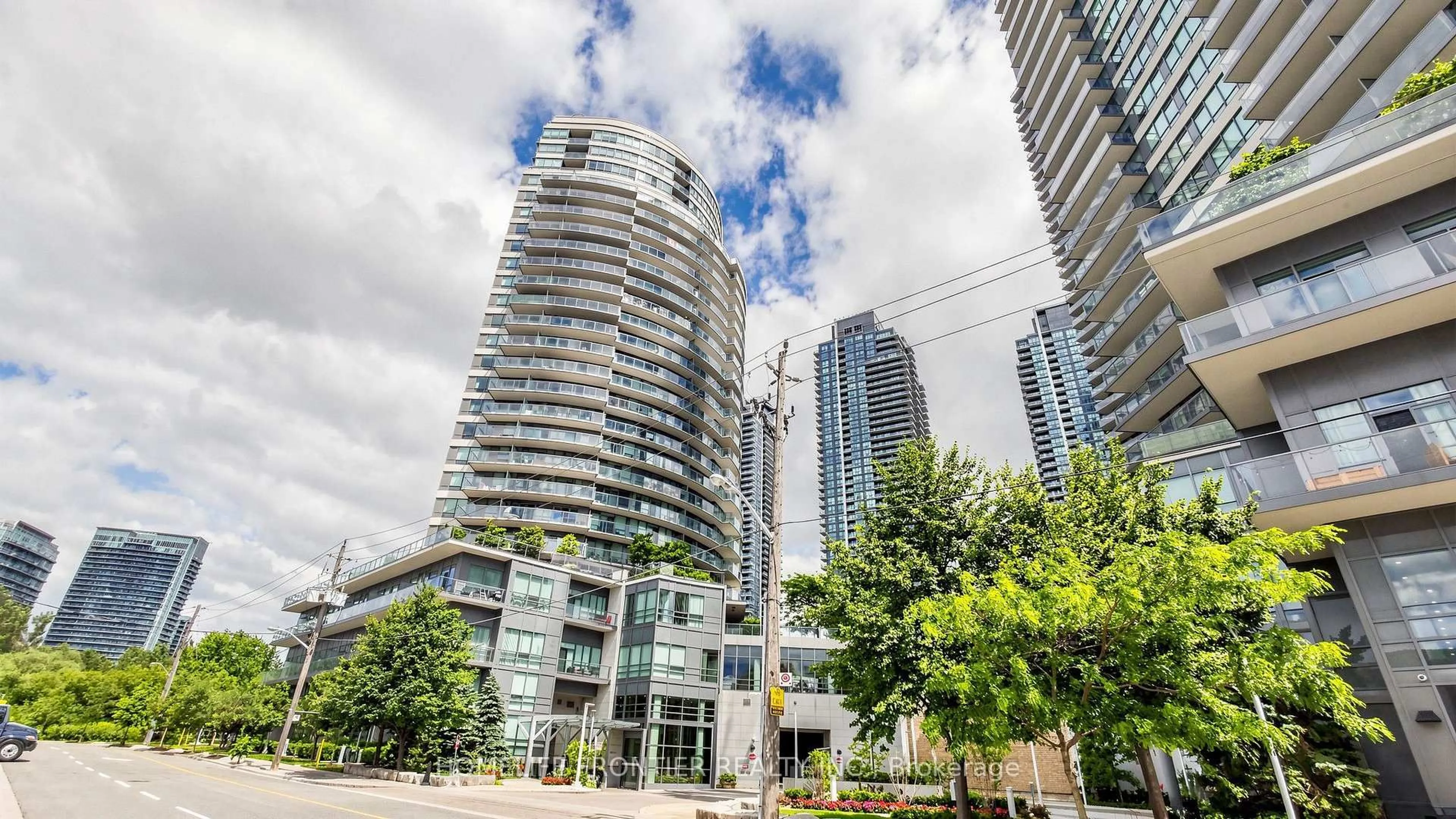 Patio, city buildings view from balcony for 15 Legion Rd #504, Toronto Ontario M8V 0A9