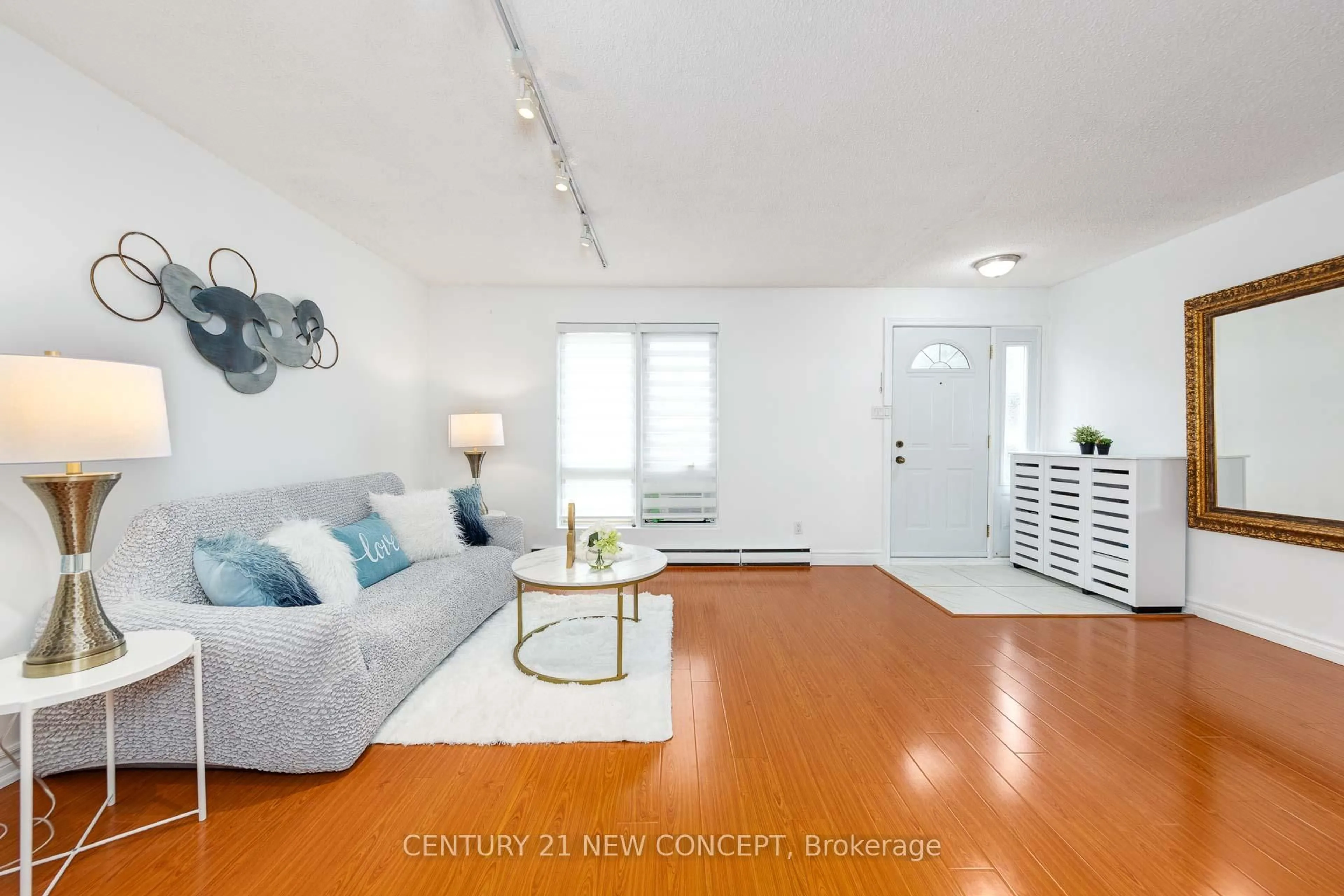 Living room with furniture, unknown for 1310 Gulleden Dr #13, Mississauga Ontario L4X 1Y9