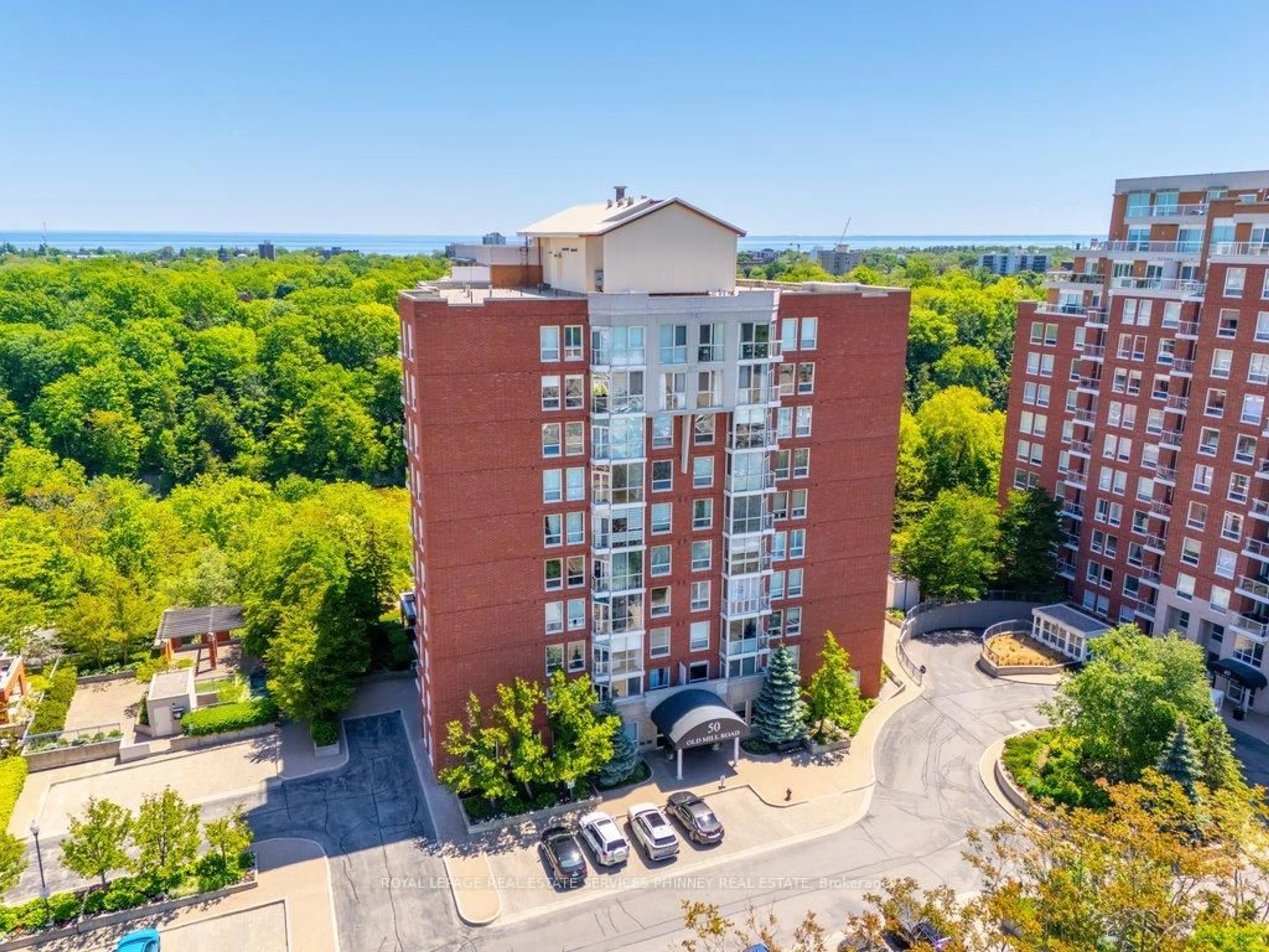 A pic from outside/outdoor area/front of a property/back of a property/a pic from drone, city buildings view from balcony for 50 Old Mill Rd #706, Oakville Ontario L6J 7W1