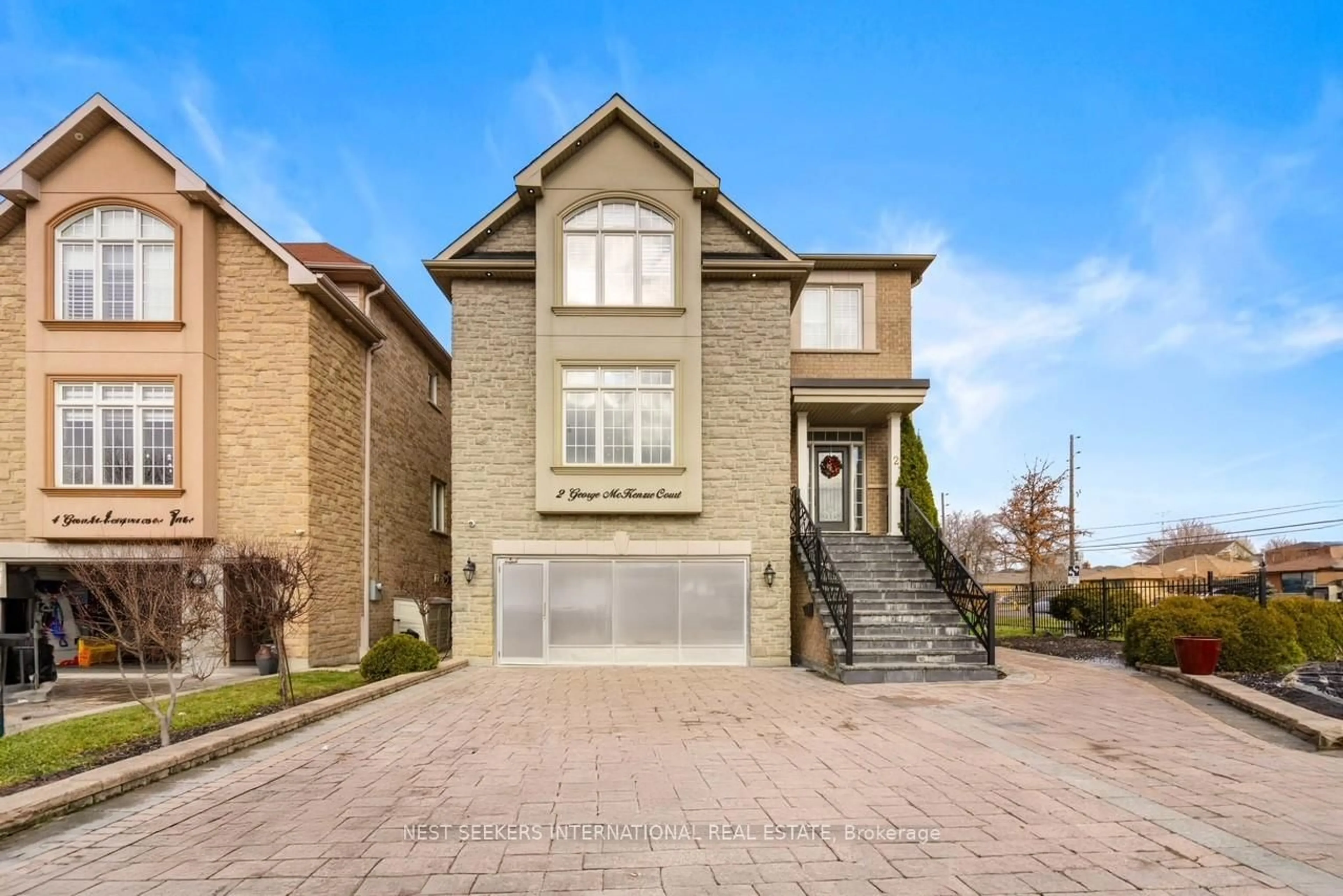 Home with brick exterior material, street for 2 George McKenzie Crt, Toronto Ontario M9M 0E1