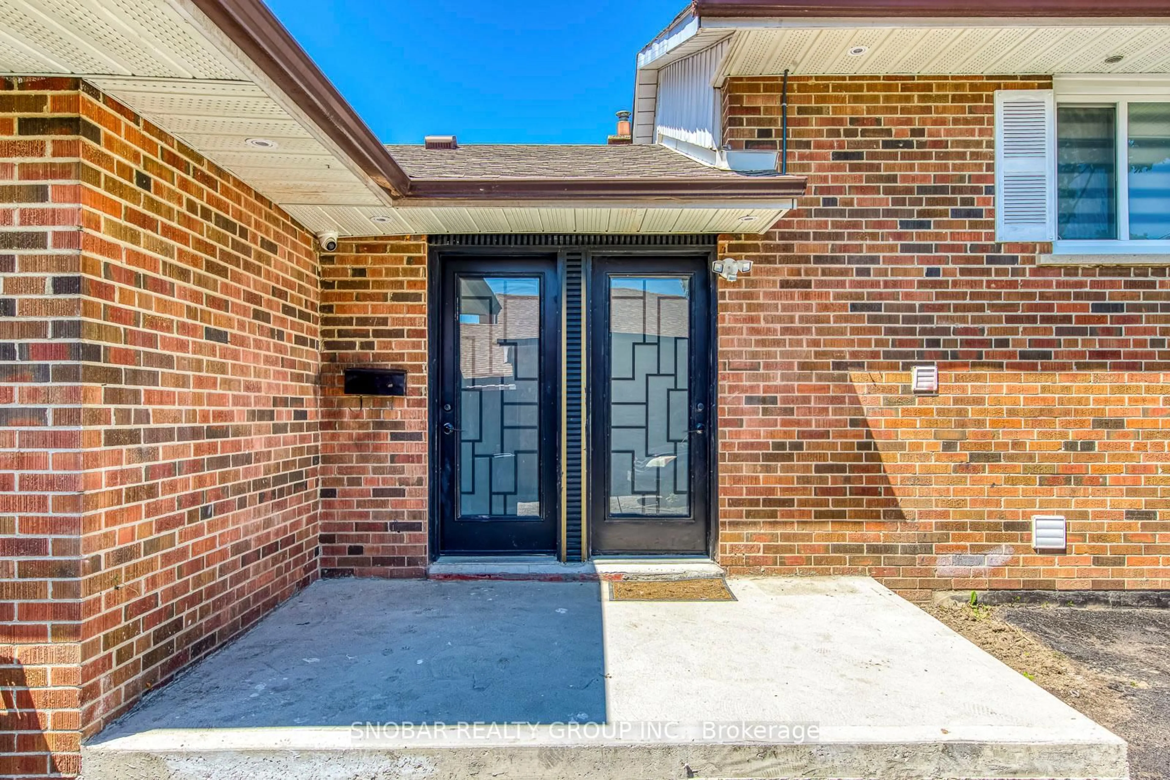 Home with brick exterior material, street for 99 Jeffcoat Dr, Toronto Ontario M9W 3B9