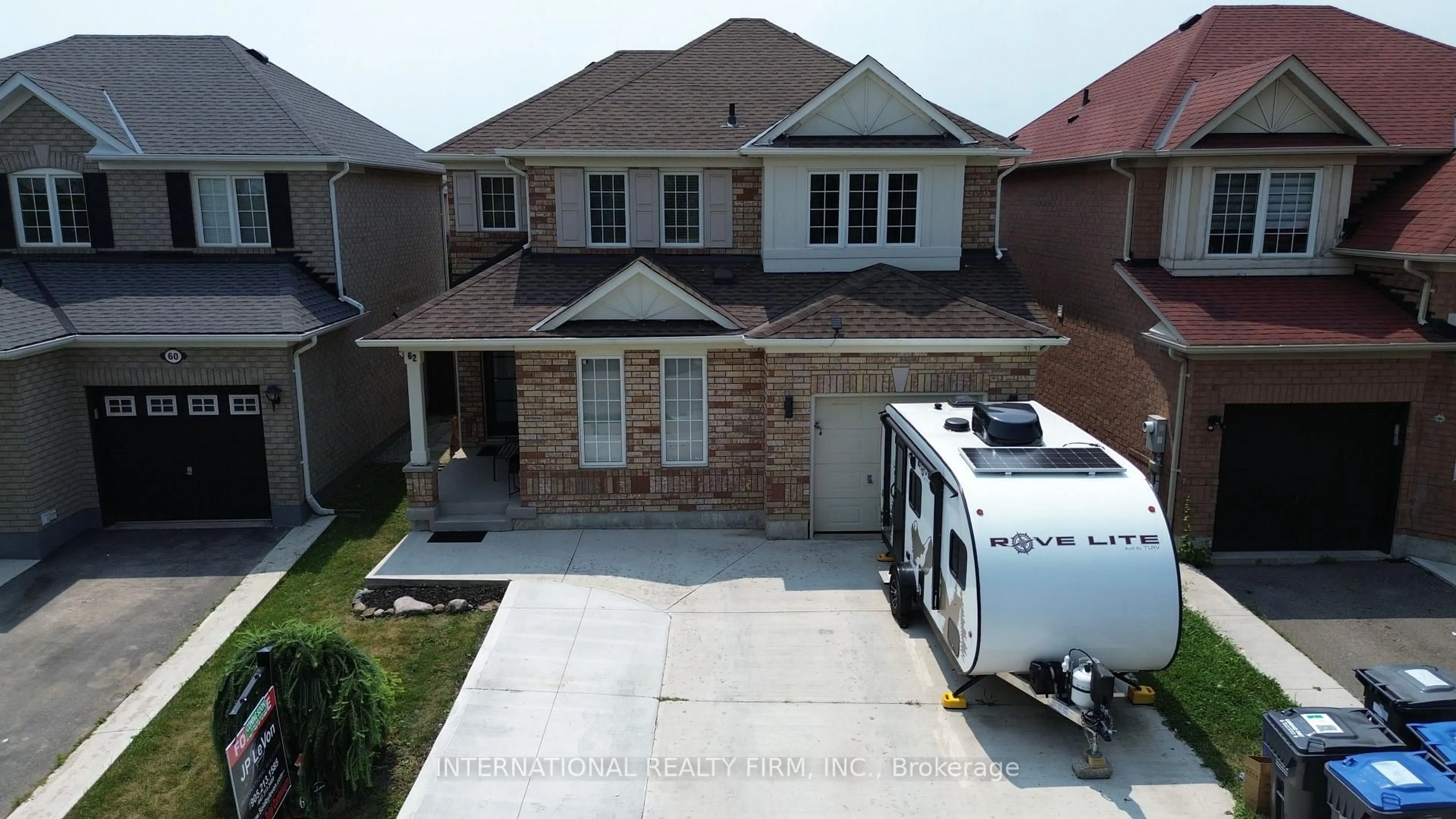 Home with brick exterior material, street for 62 Williamson Dr, Brampton Ontario L7A 3M1