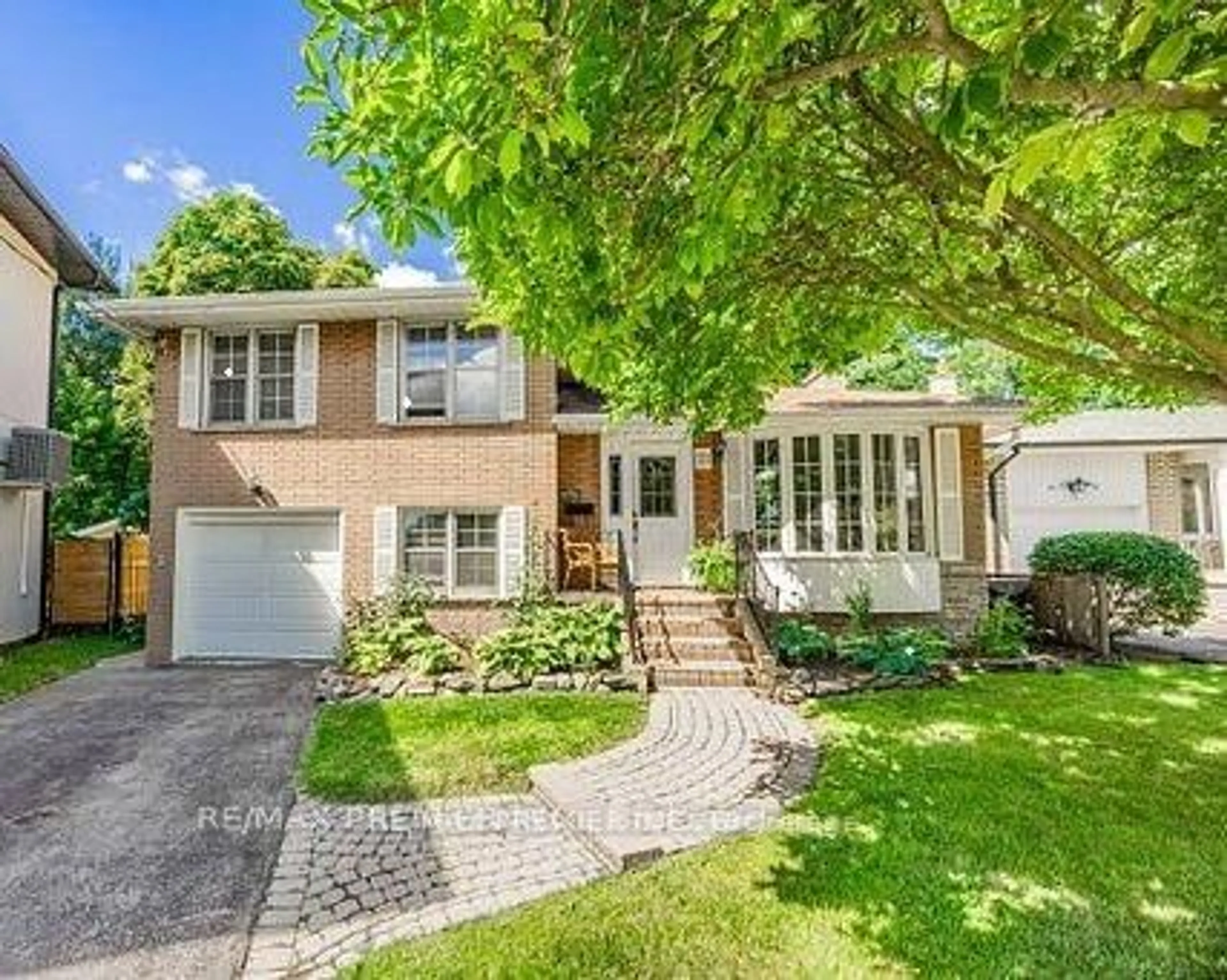 Home with brick exterior material, street for 21 Halbadier Pl, Toronto Ontario M9B 2H4
