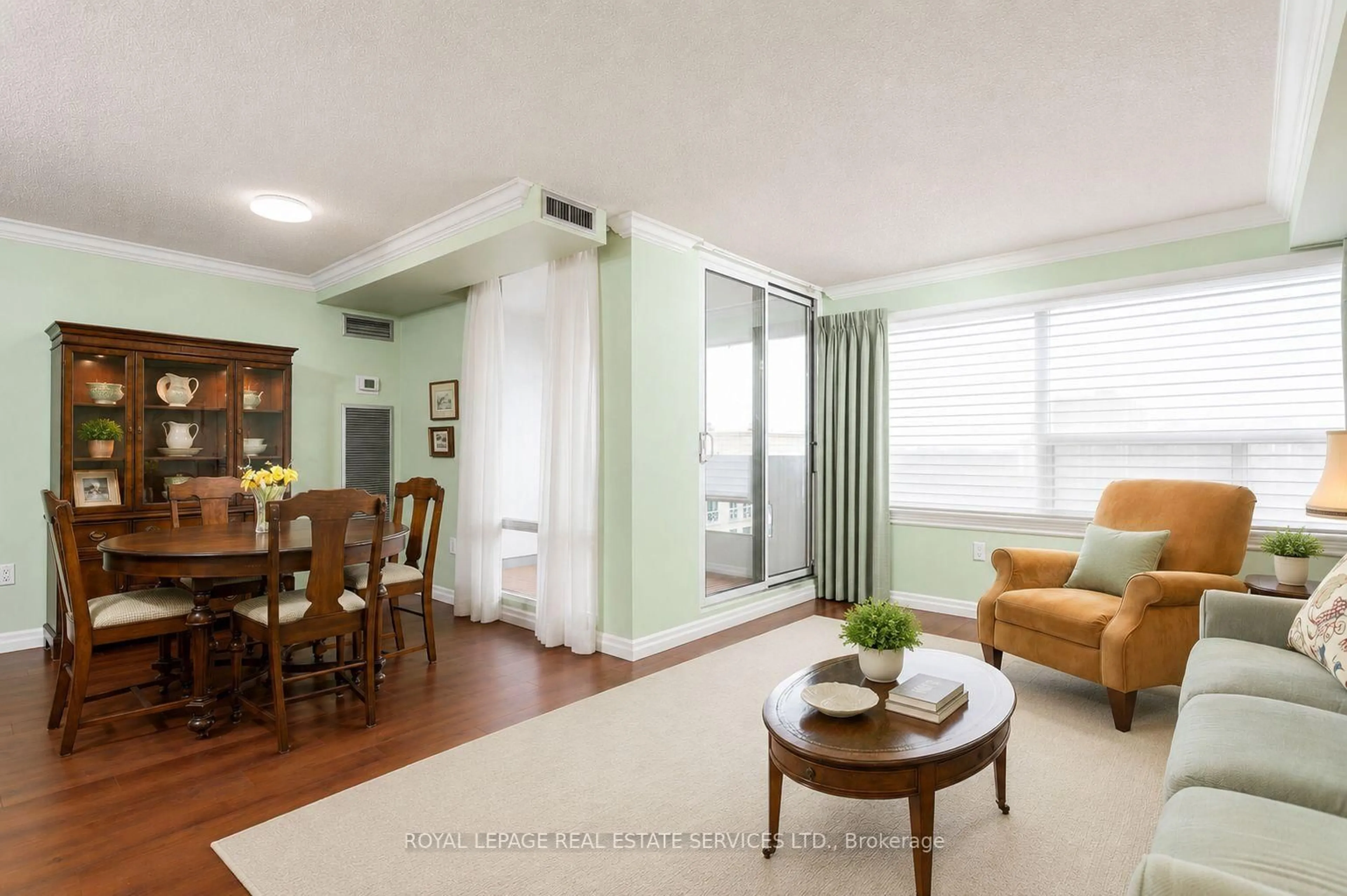 Living room with furniture, wood/laminate floor for 475 The West Mall #1408, Toronto Ontario M9C 4Z3