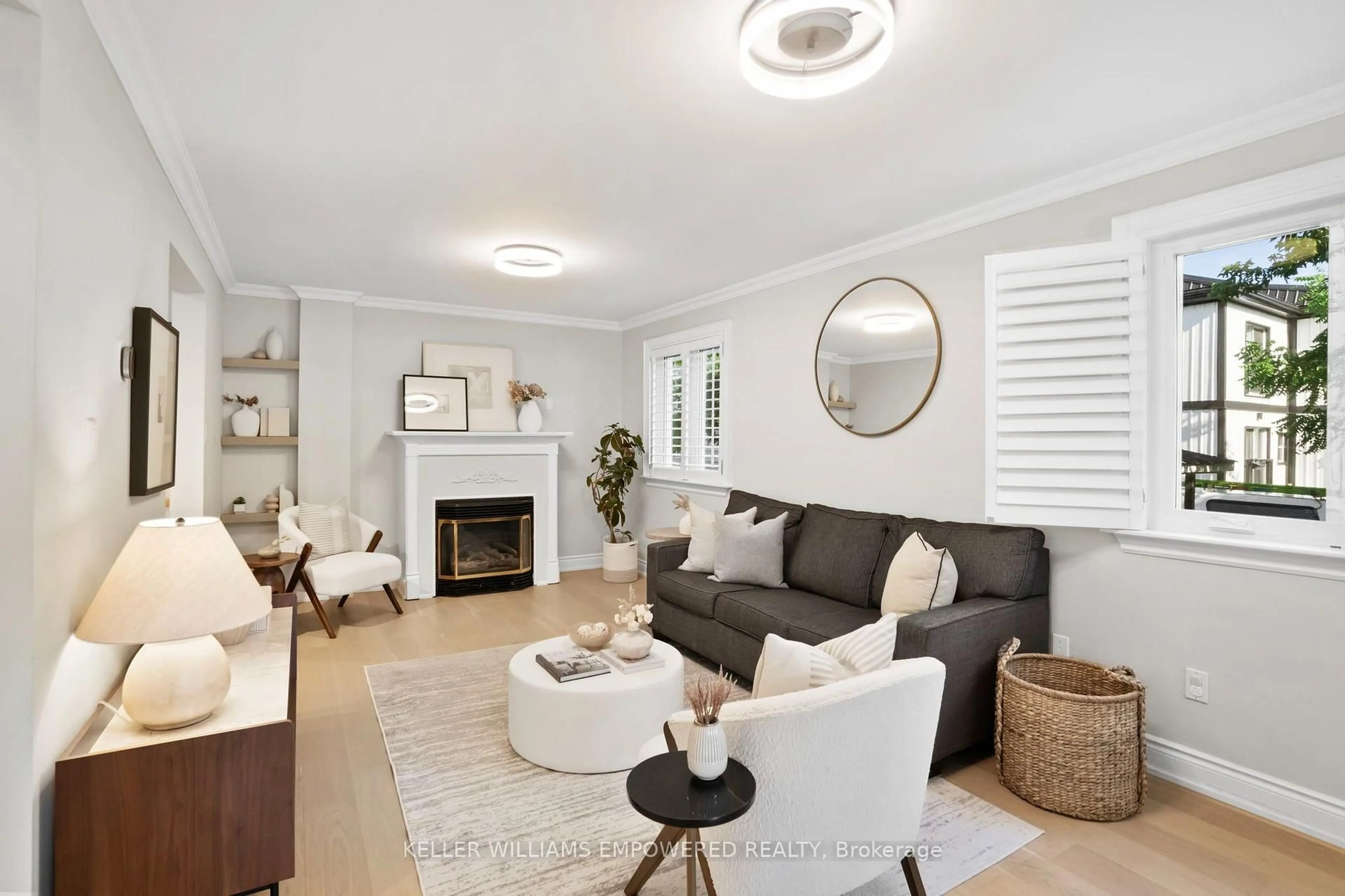 Living room with furniture, wood/laminate floor for 88 Foch Ave, Toronto Ontario M8W 3X6
