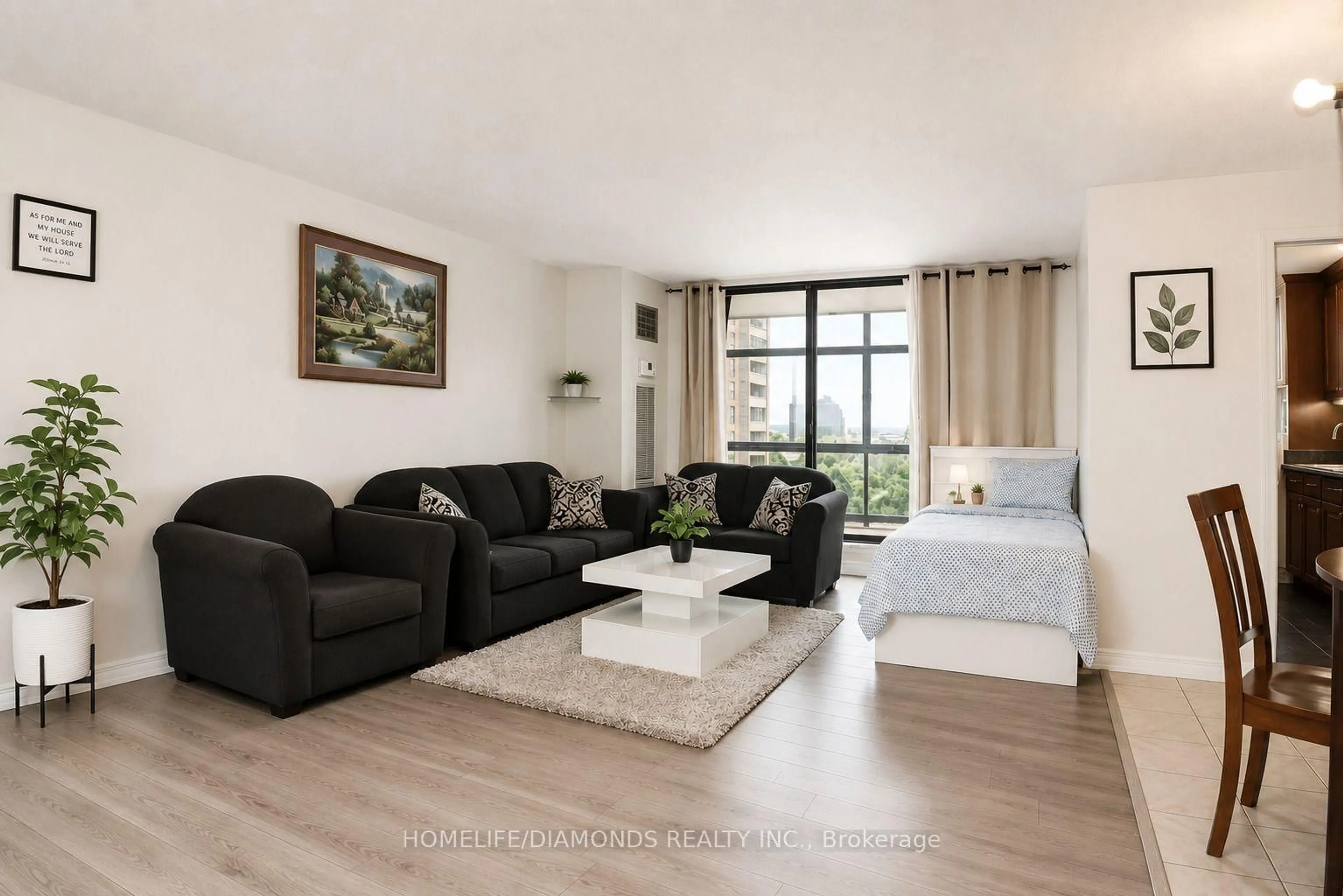 Living room with furniture, wood/laminate floor for 18 Knightsbridge Rd #1411, Brampton Ontario L6T 3X5
