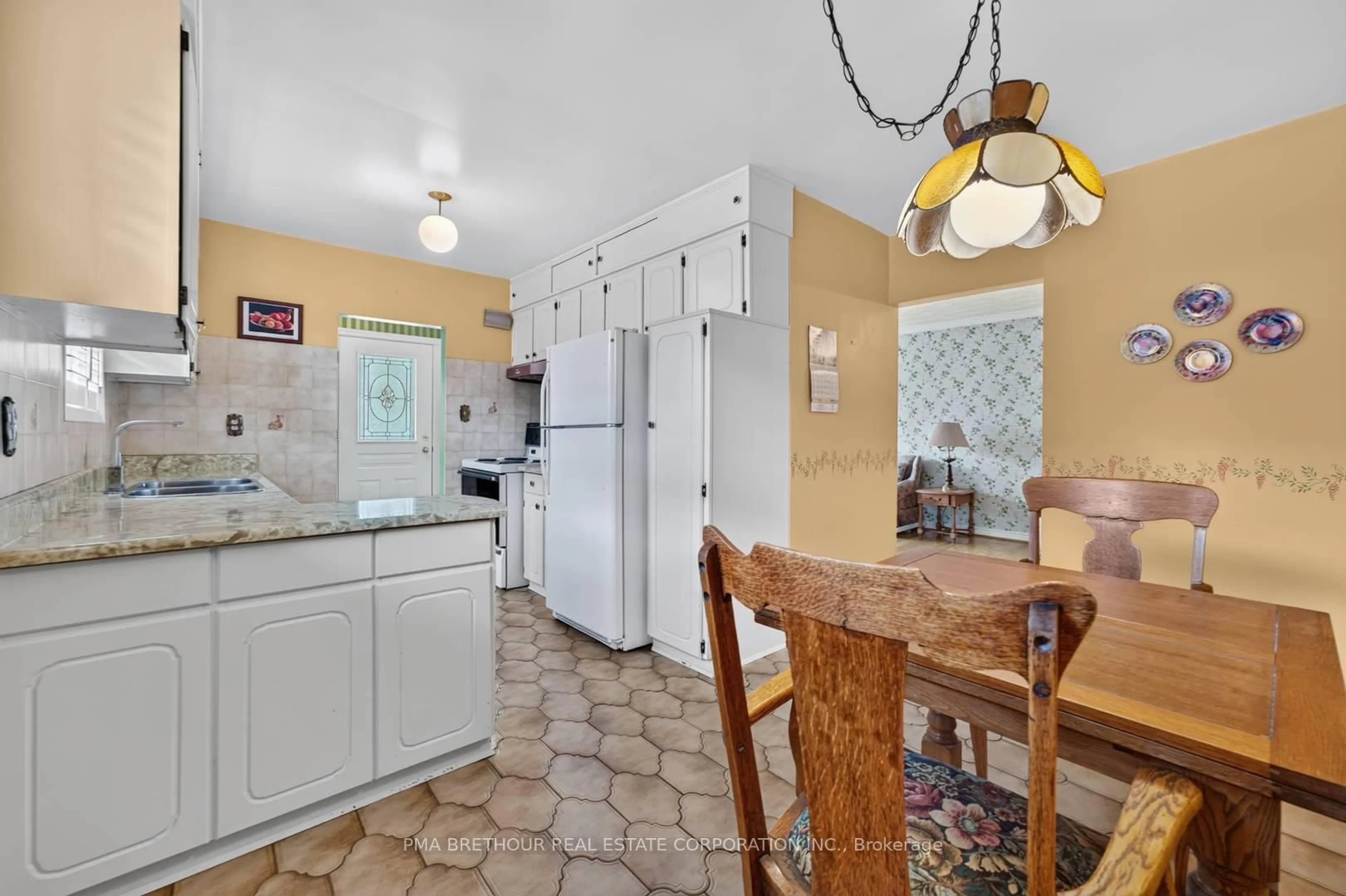 Standard kitchen, ceramic/tile floor for 65 Goldsboro Rd, Toronto Ontario M9L 1A6