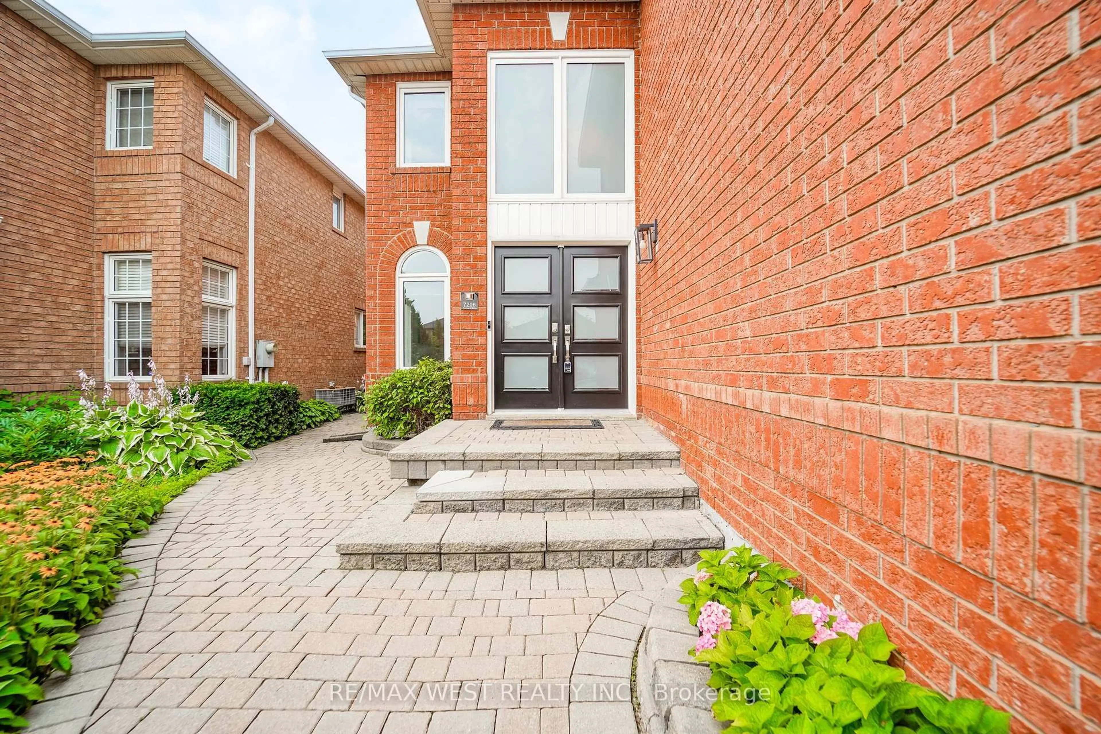 Home with brick exterior material, street for 7206 Terragar Blvd, Mississauga Ontario L5N 7M5