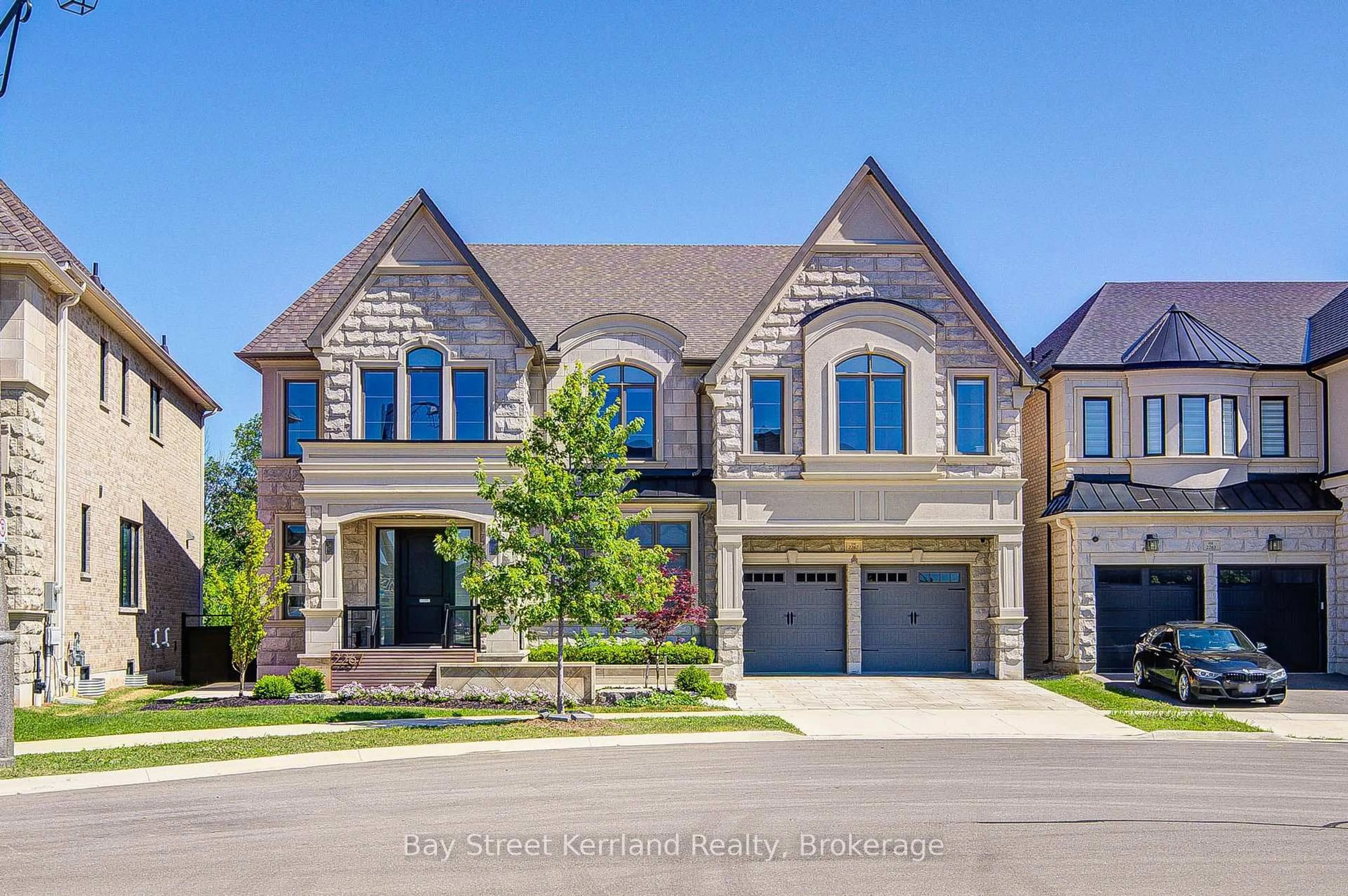 Home with brick exterior material, street for 2267 Saw Whet Blvd, Oakville Ontario L6M 5M9