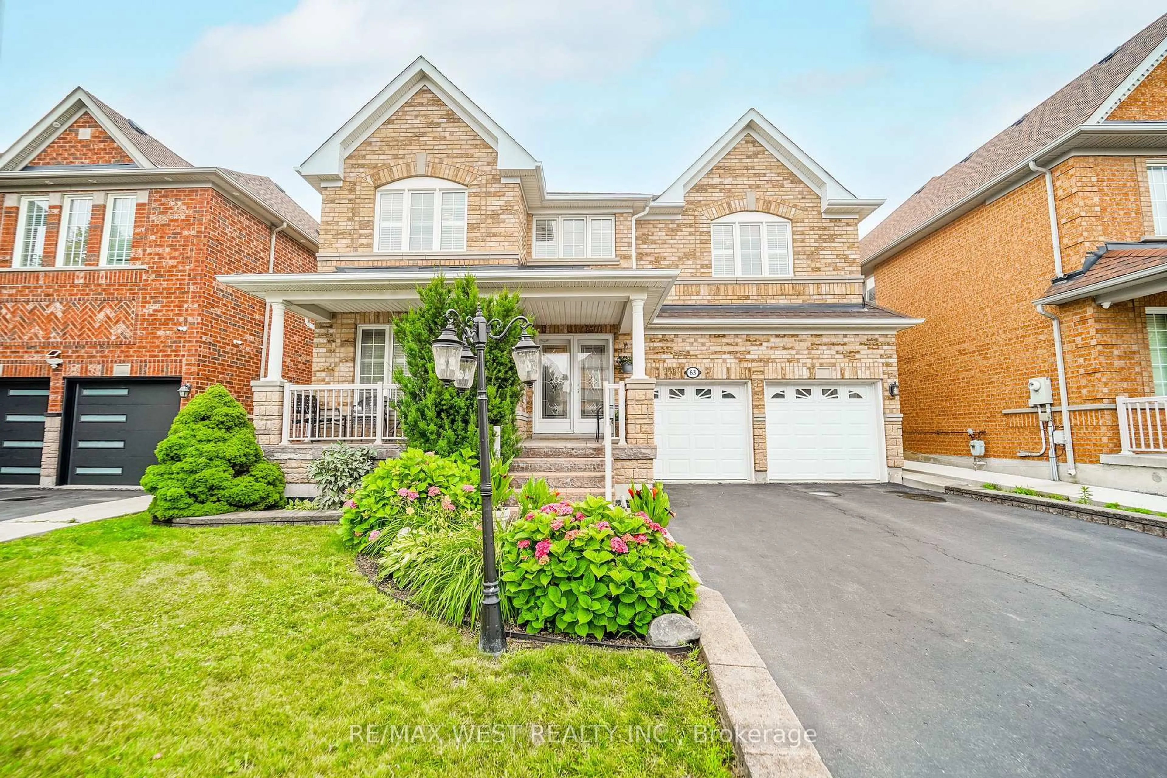 Home with brick exterior material, street for 63 Lockheed Cres, Brampton Ontario L7A 3G4