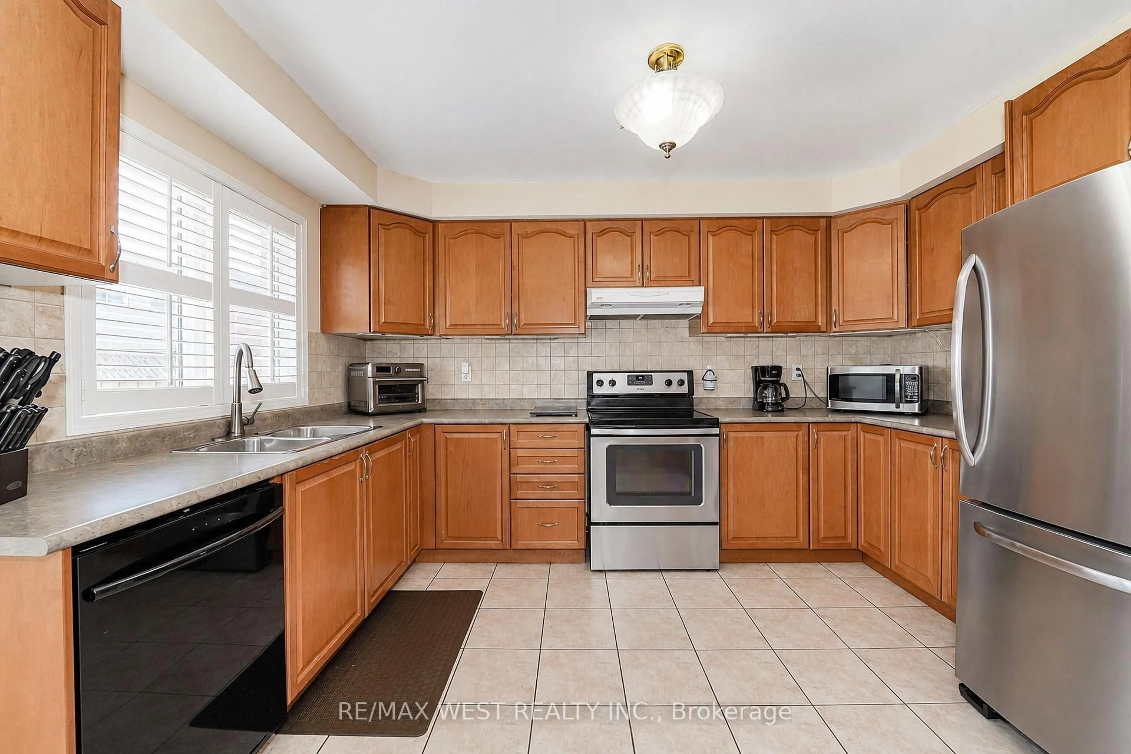 Standard kitchen, ceramic/tile floor for 63 Lockheed Cres, Brampton Ontario L7A 3G4