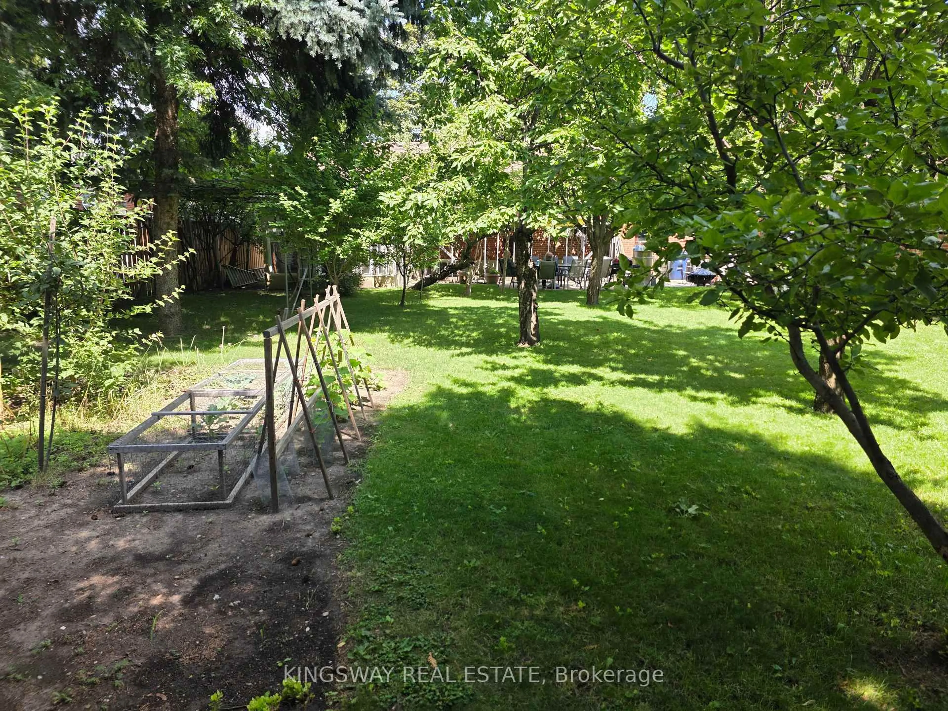 A pic from outside/outdoor area/front of a property/back of a property/a pic from drone, forest/trees view for 18 Blaketon Rd, Toronto Ontario M9B 4W1