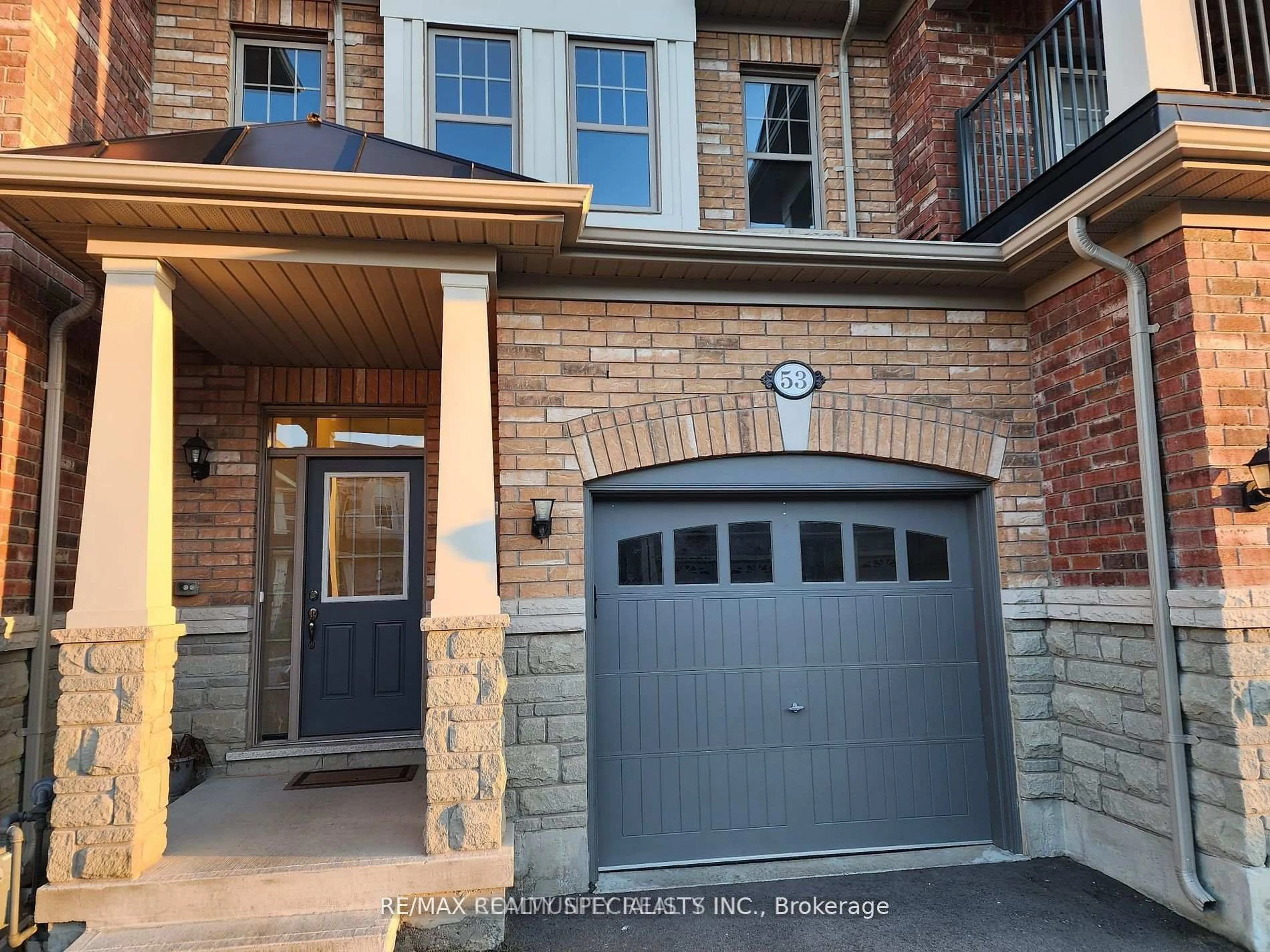 Home with brick exterior material, street for 53 Hogan Manor Dr, Brampton Ontario L7A 4V2