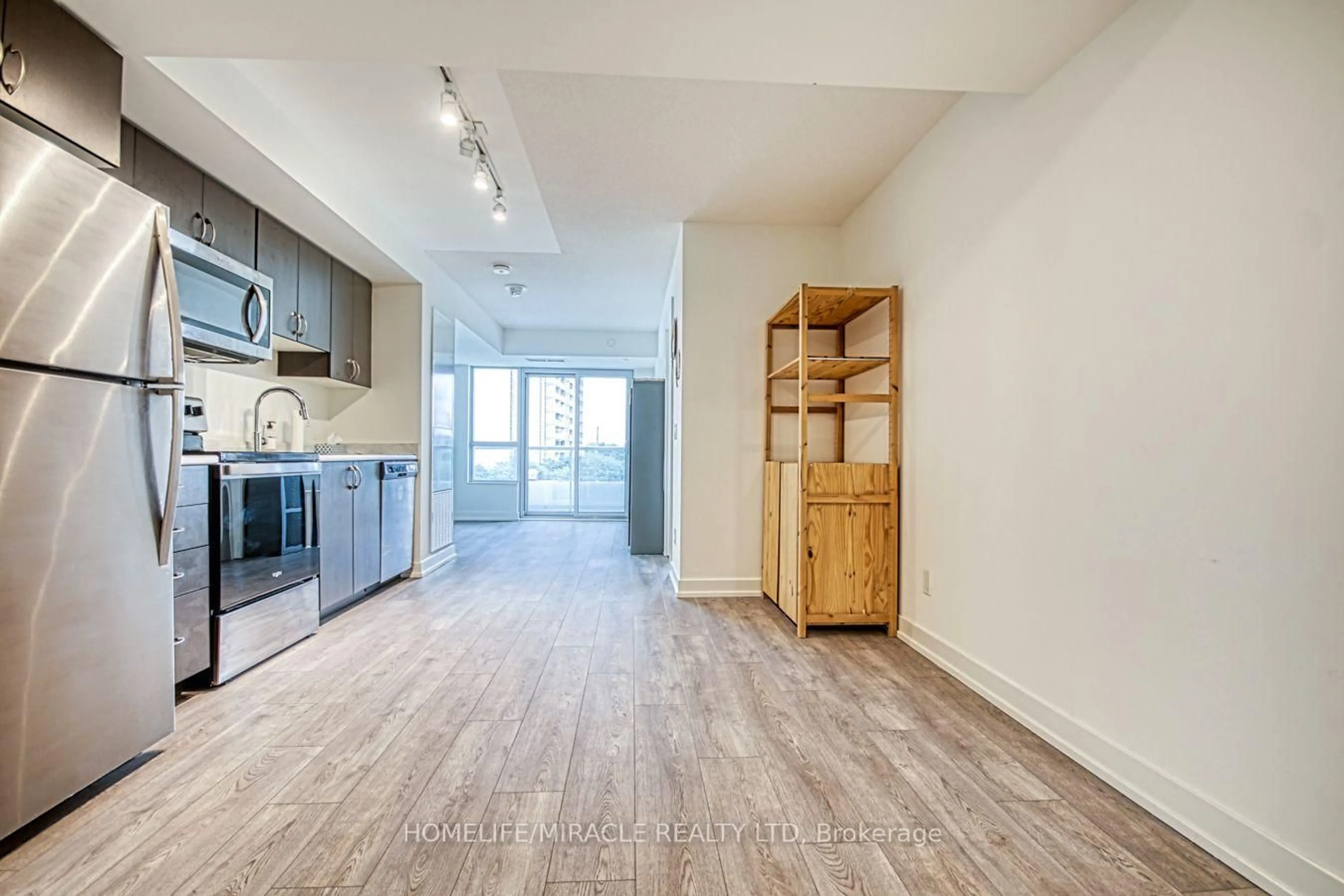 Open concept kitchen, wood/laminate floor for 10 Wilby Cres #402, Toronto Ontario M9N 1E6