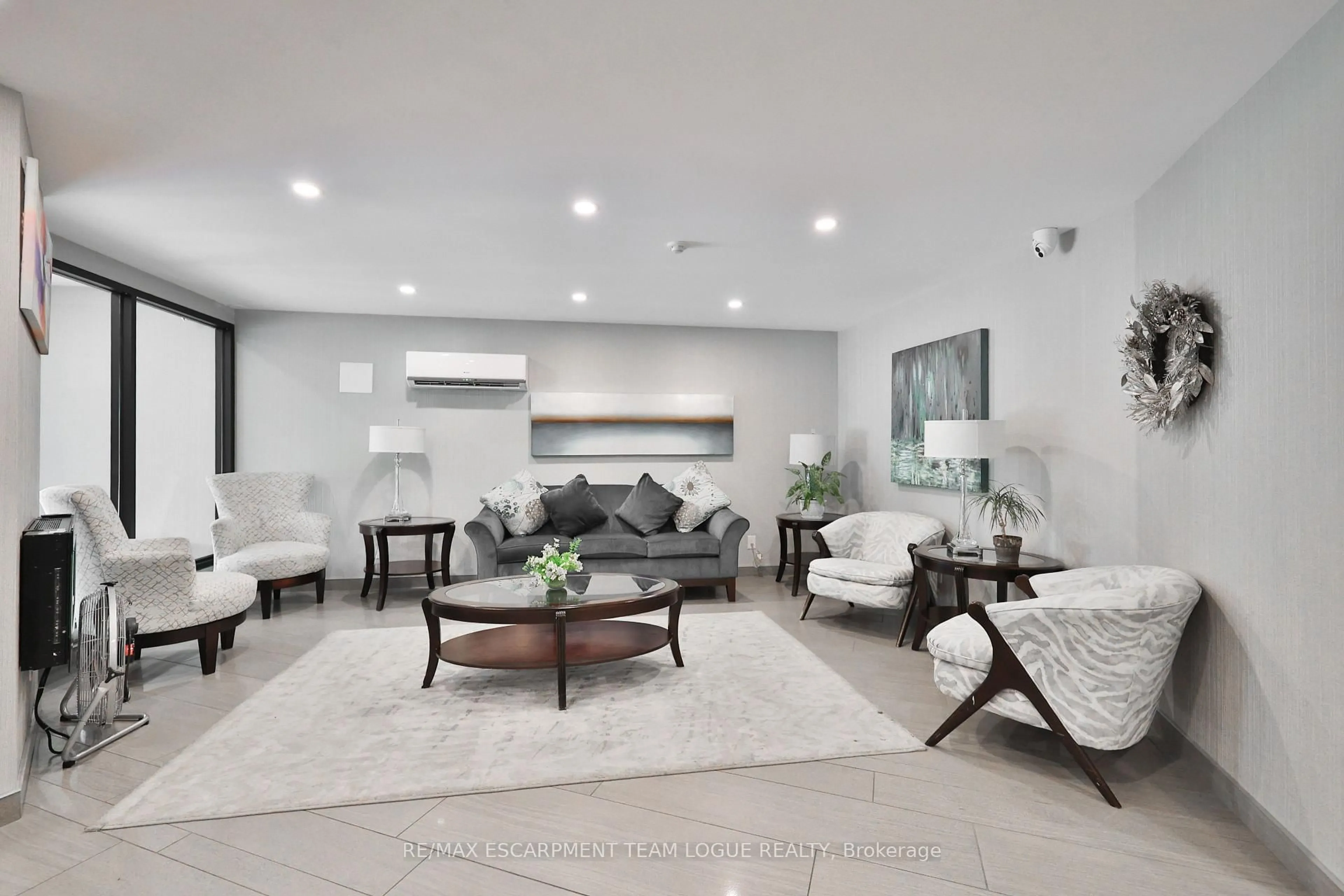 Living room with furniture, unknown for 700 Dynes Rd #401, Burlington Ontario L7N 3M2