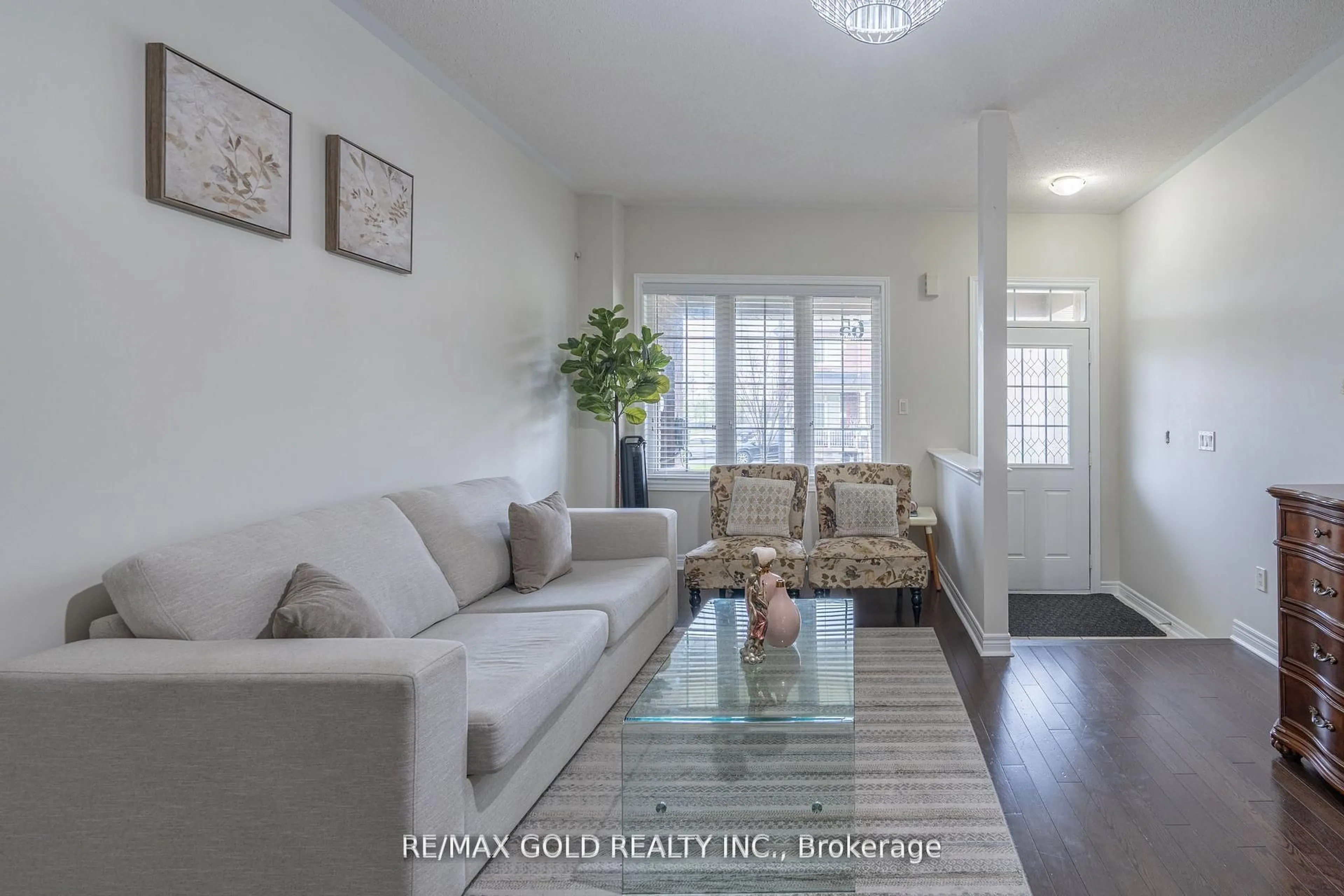 Living room with furniture, unknown for 65 Villadowns Tr, Brampton Ontario L6R 3Y8