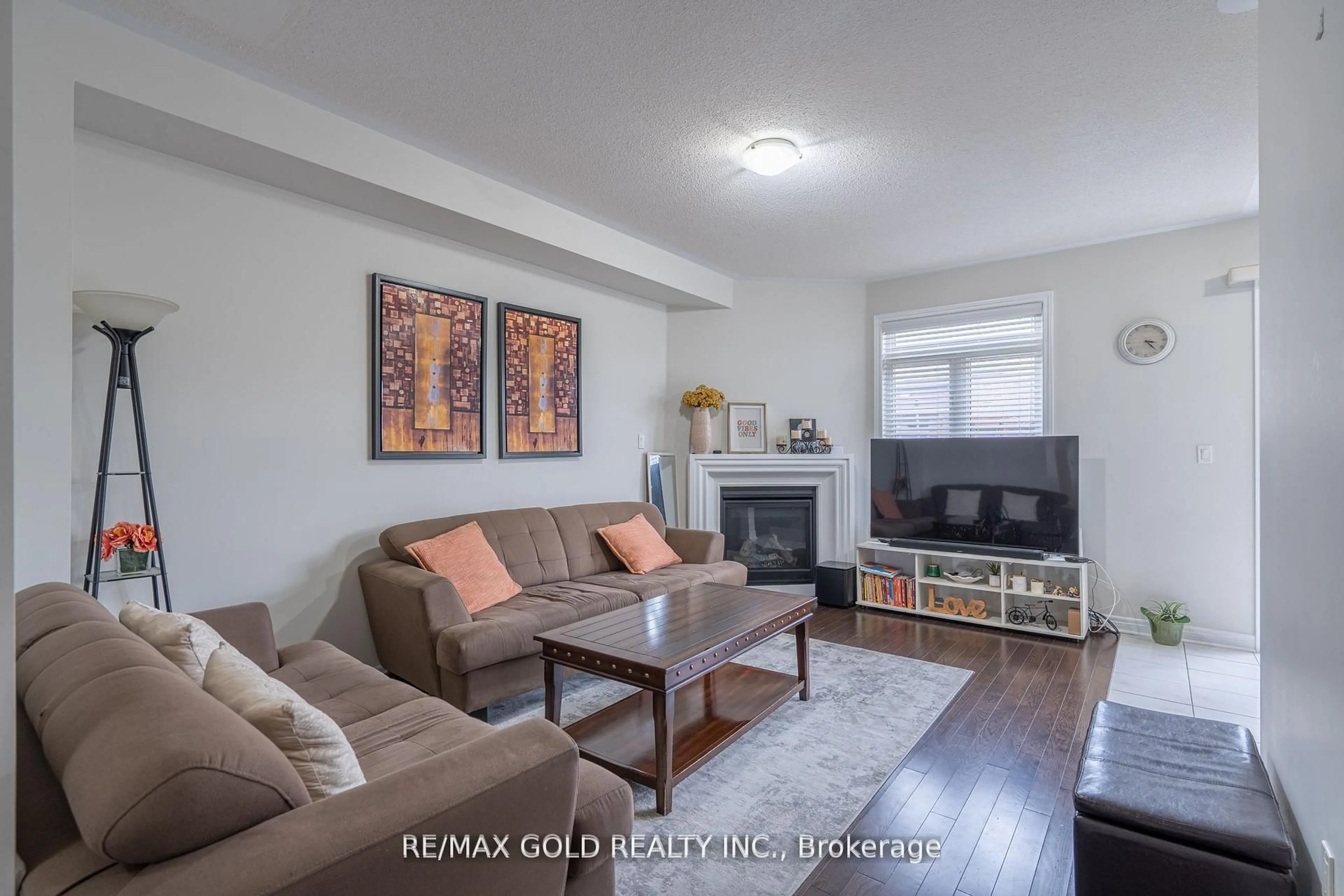 Living room with furniture, unknown for 65 Villadowns Tr, Brampton Ontario L6R 3Y8
