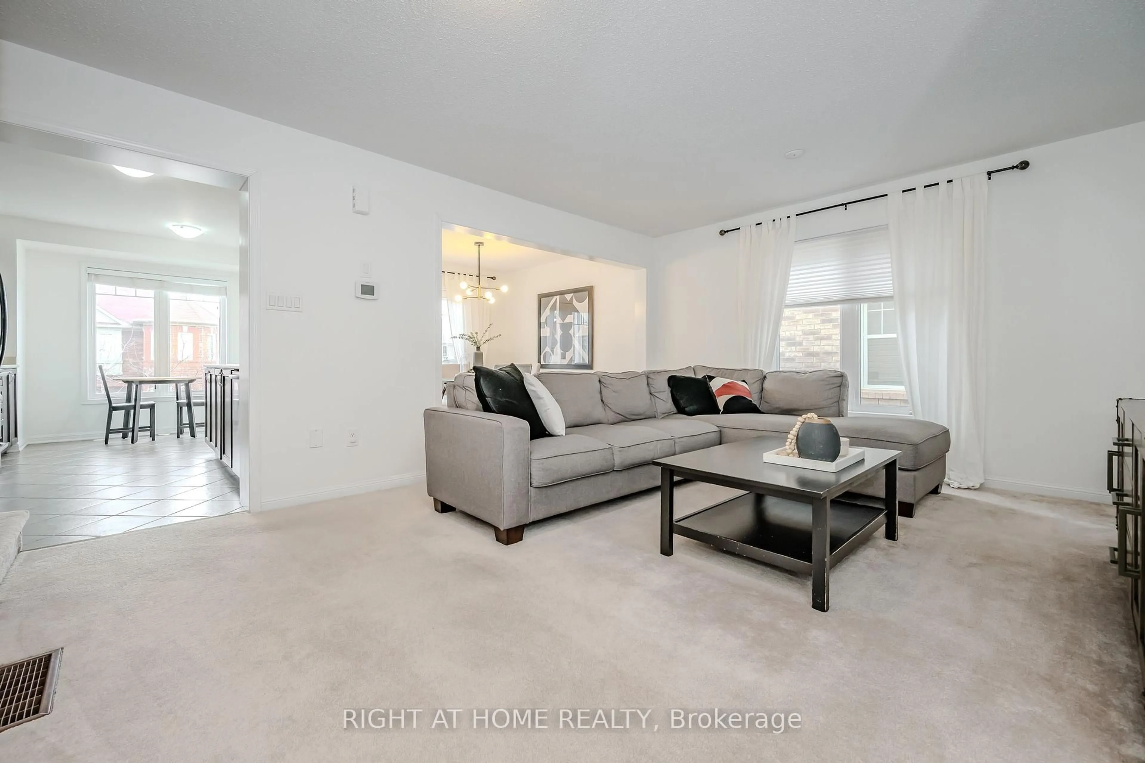 Living room with furniture, unknown for 525 Cavanagh Lane, Milton Ontario L9T 8G4