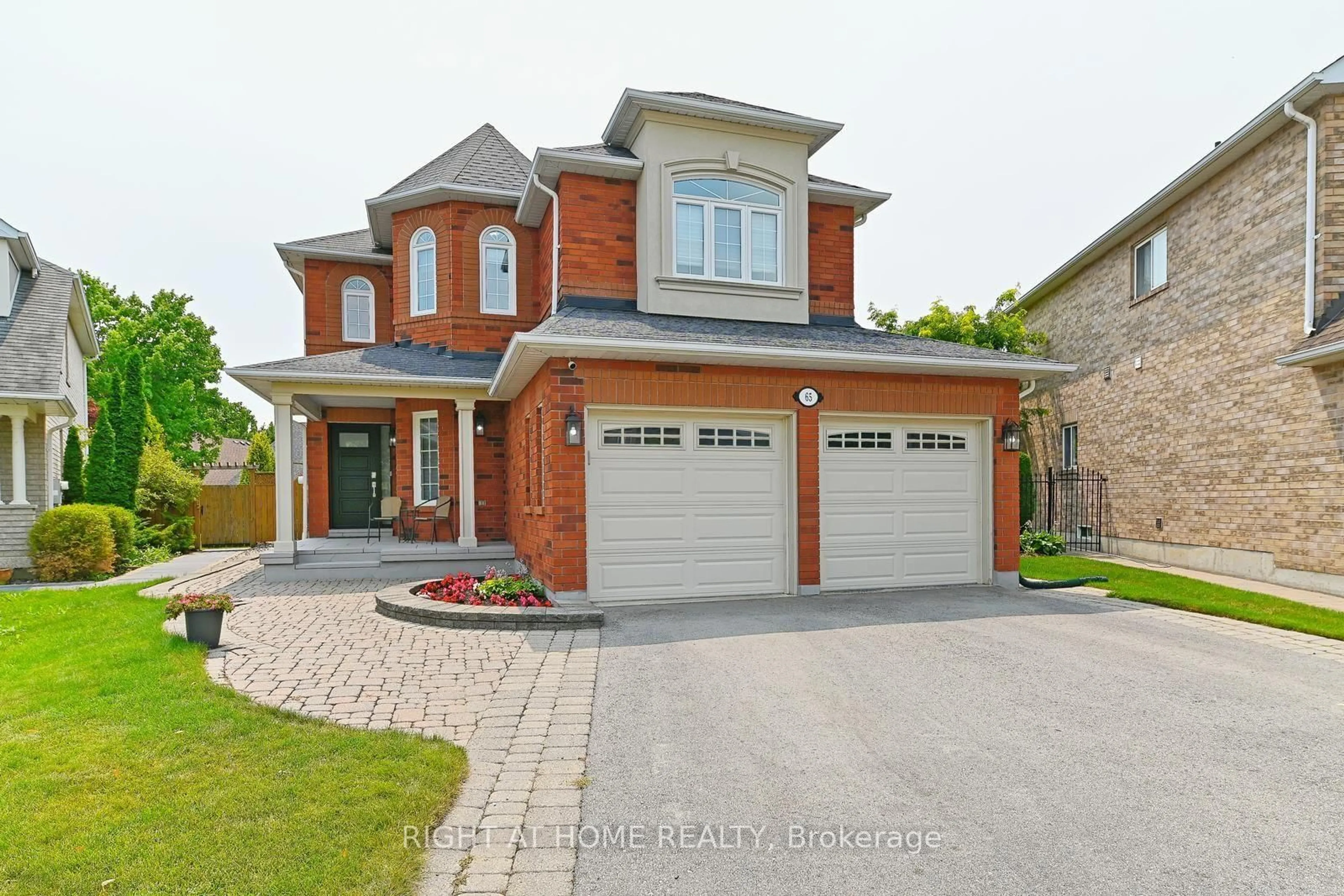 Home with brick exterior material, street for 65 Baybrook Rd, Brampton Ontario L7A 1L4
