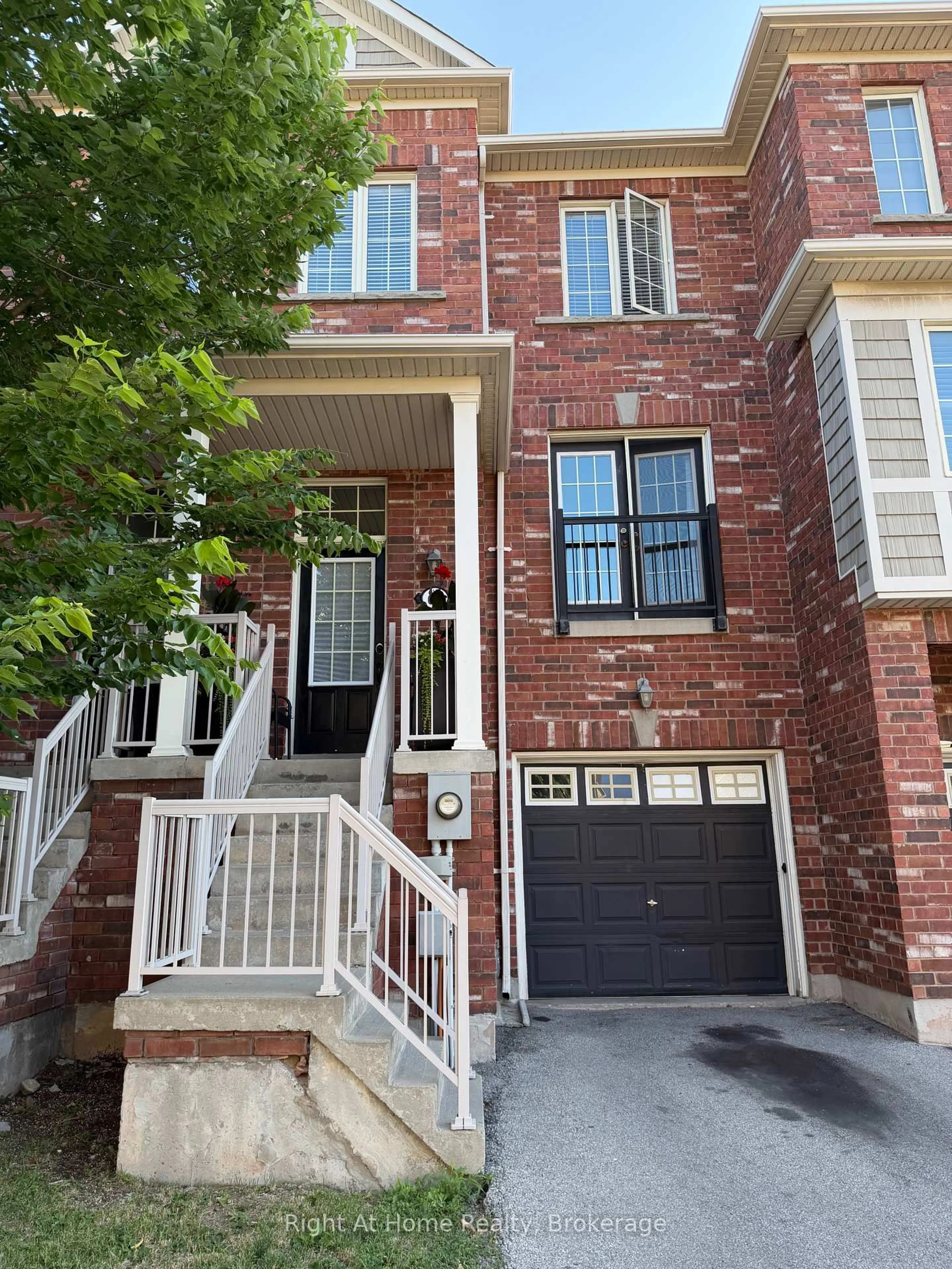 Home with brick exterior material, street for 2179 Fiddlers Way #65, Oakville Ontario L6M 0L6
