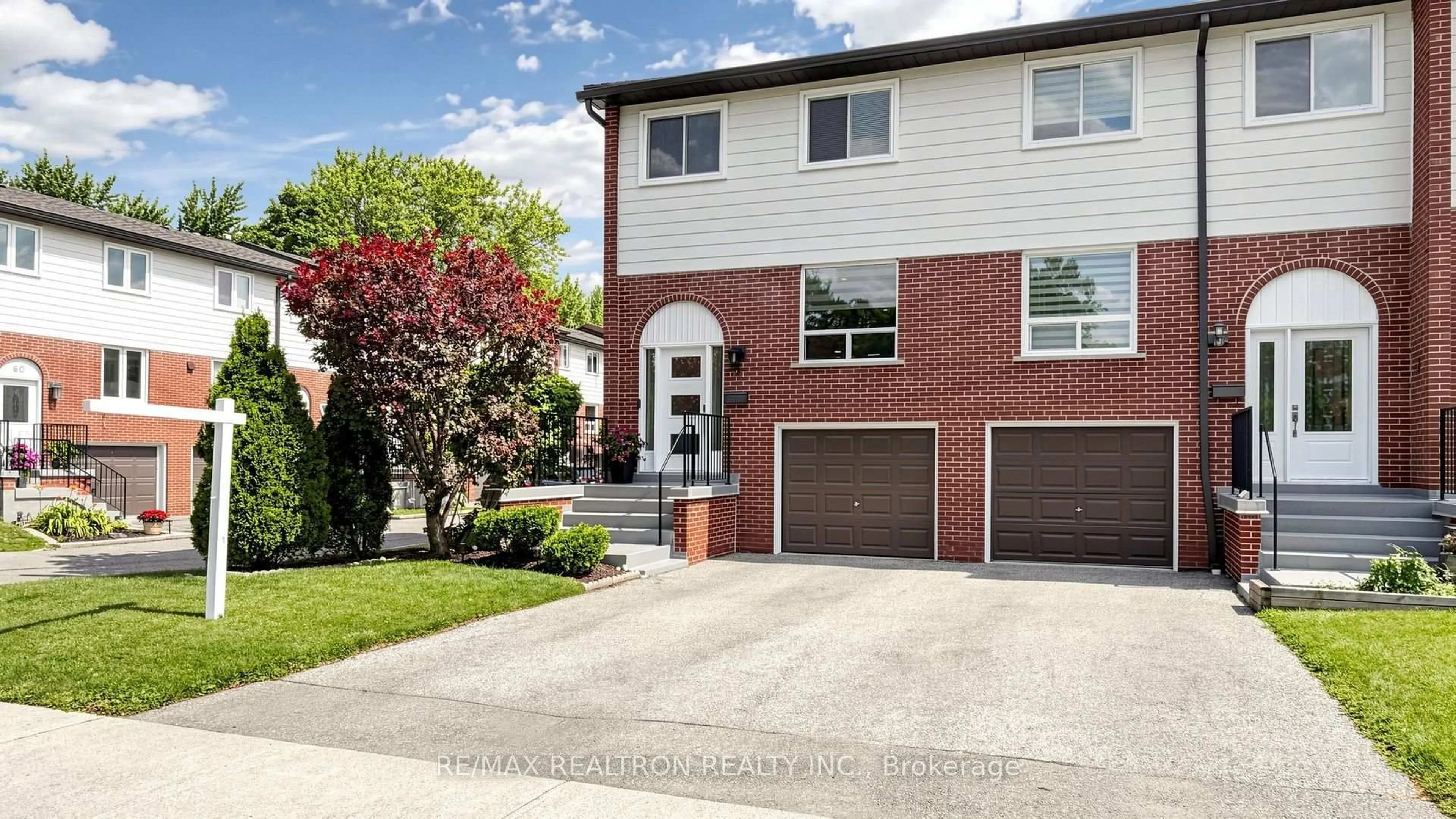 Home with brick exterior material, street for 2445 Homelands Dr #18, Mississauga Ontario L5K 2C6