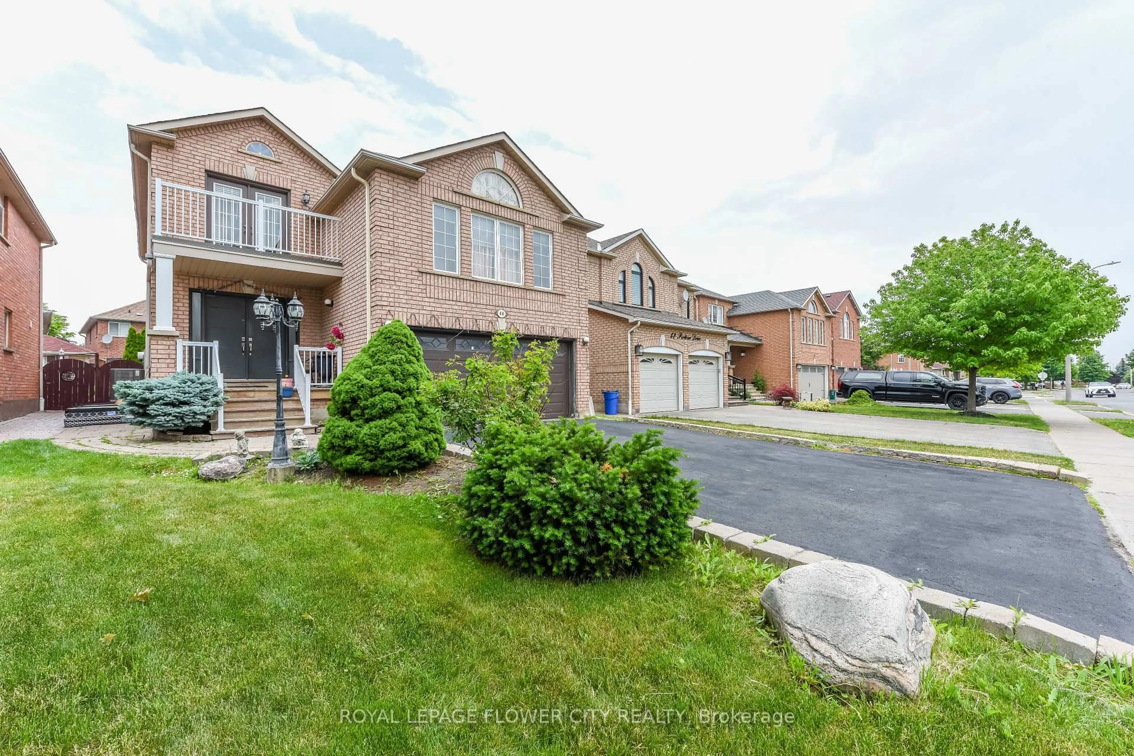 Home with brick exterior material, street for 46 Pertosa Dr, Brampton Ontario L6X 4W8