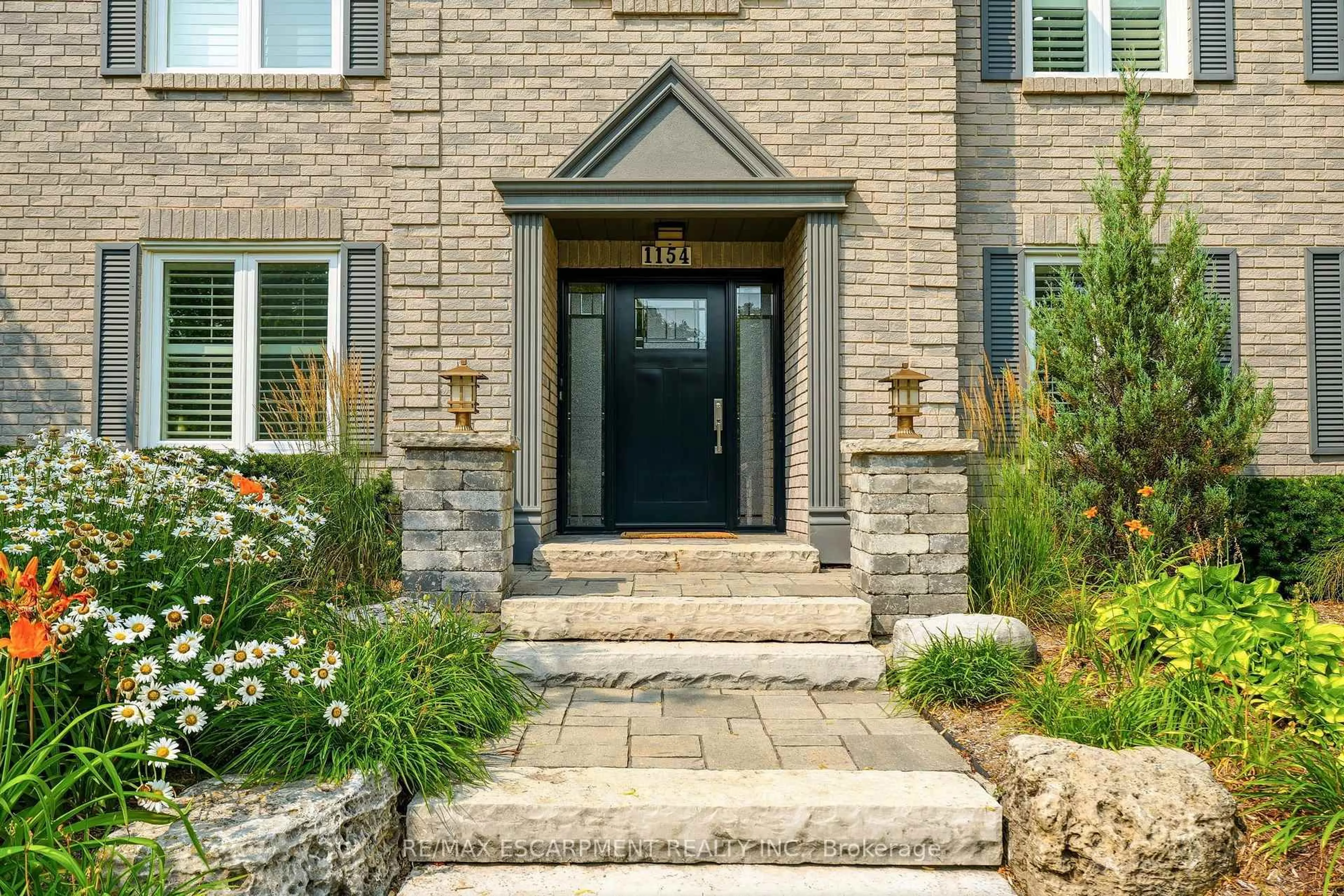 Home with brick exterior material, street for 1154 Windrush Dr, Oakville Ontario L6M 1T8