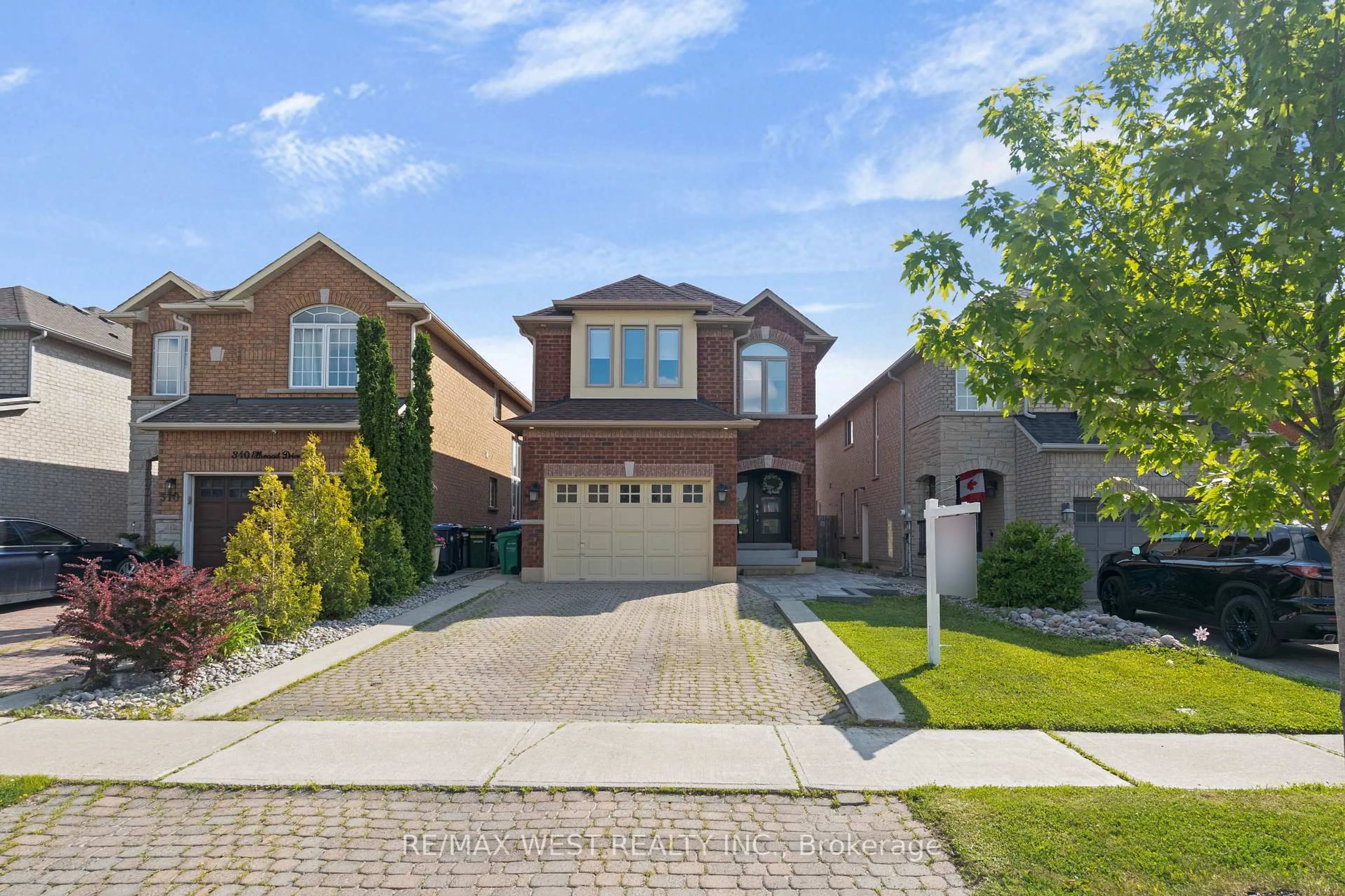 Home with brick exterior material, street for 312 Ellwood Dr, Caledon Ontario L7E 2G9