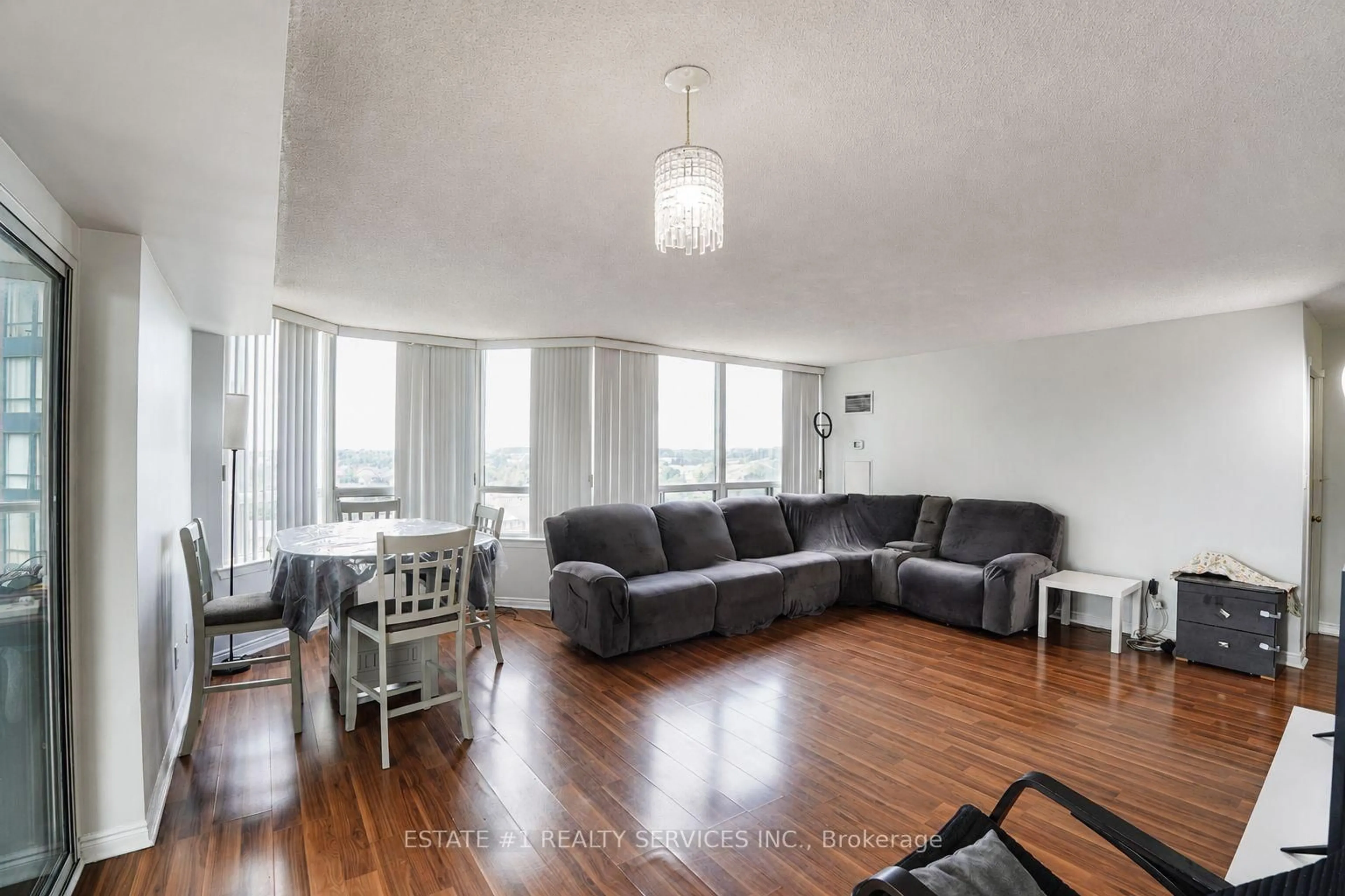 Living room with furniture, wood/laminate floor for 135 Hillcrest Ave #904, Mississauga Ontario L5B 4B1
