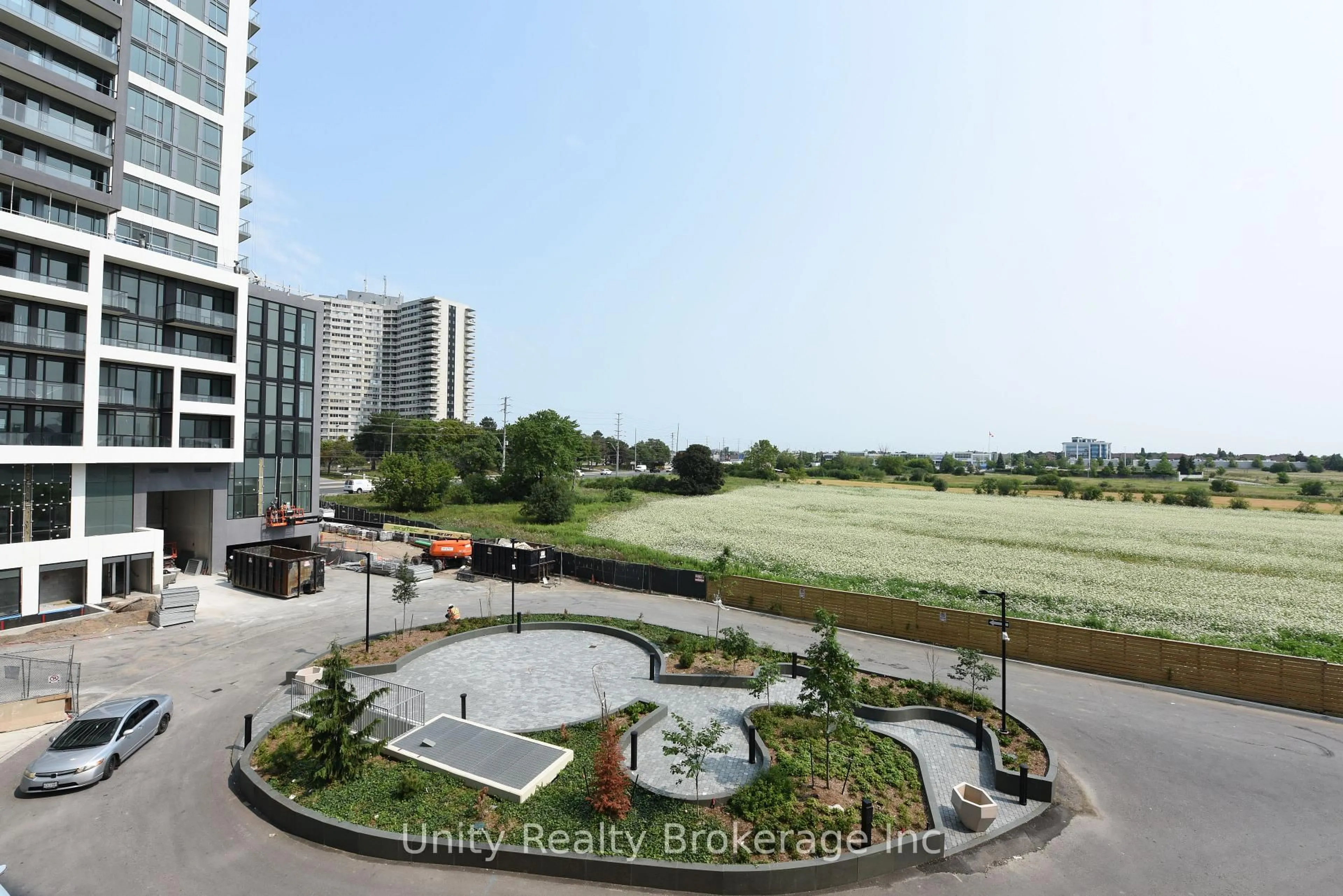 A pic from outside/outdoor area/front of a property/back of a property/a pic from drone, city buildings view from balcony for 225 Malta Ave #302, Brampton Ontario L6Y 6L6