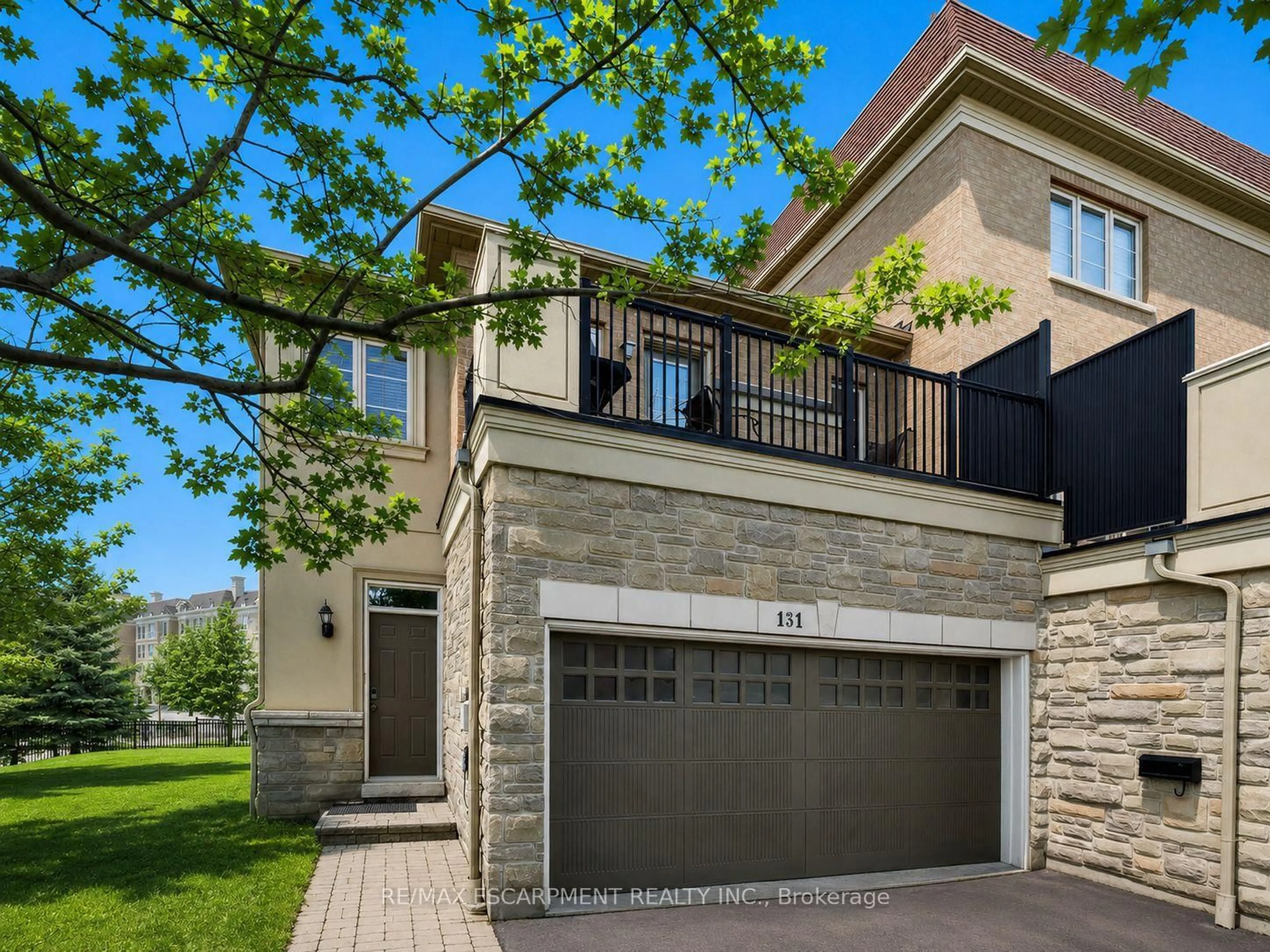 Home with brick exterior material, street for 131 Robert Speck Pkwy, Mississauga Ontario L4Z 0A6
