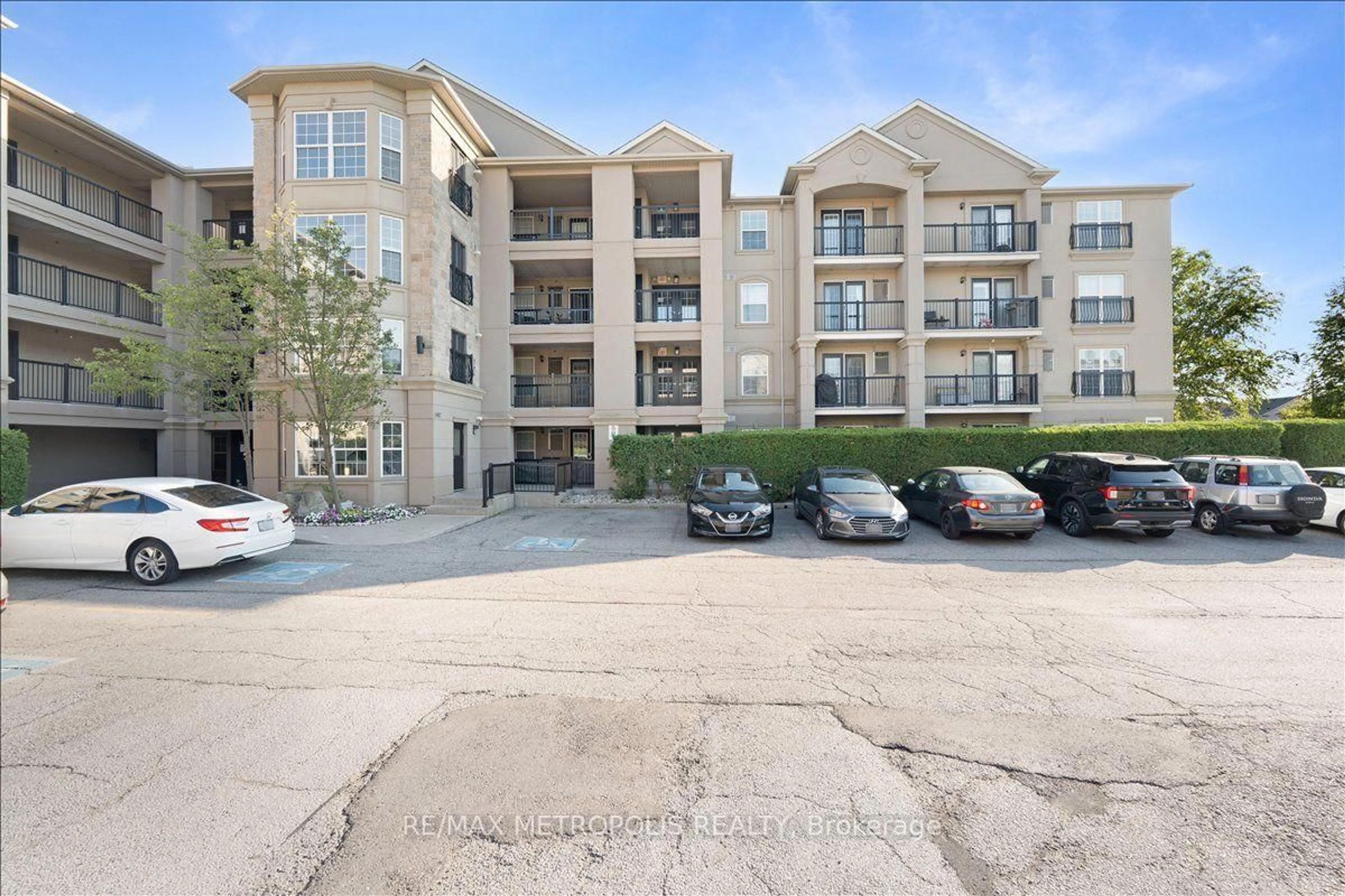 A pic from outside/outdoor area/front of a property/back of a property/a pic from drone, unknown for 1487 Maple Ave #307, Milton Ontario L9T 0B7
