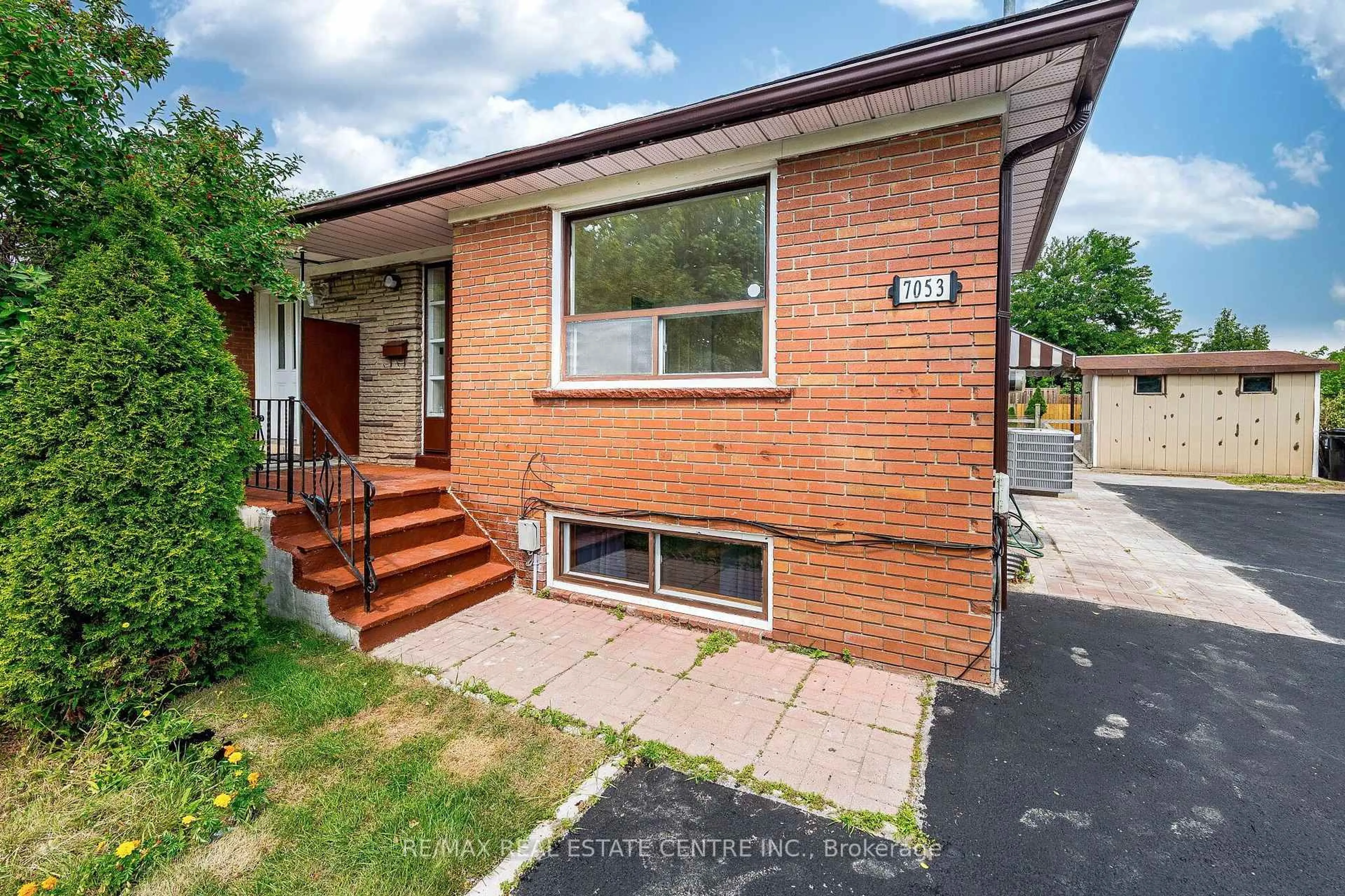 Home with brick exterior material, street for 7053 Harwick Dr, Mississauga Ontario L4T 3A3