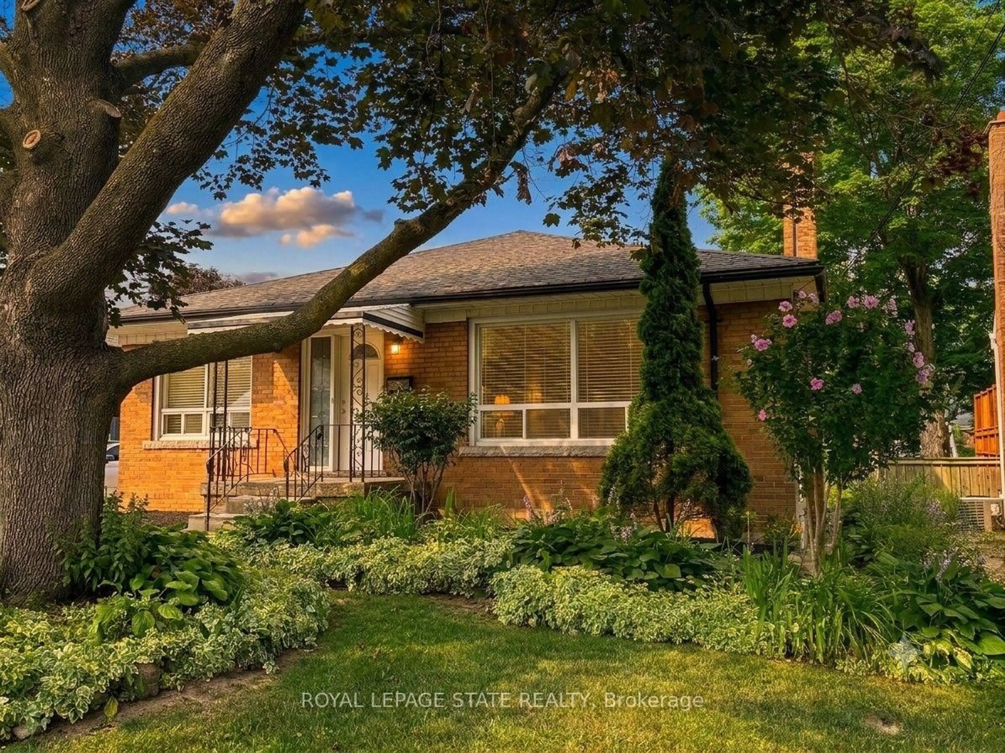 Home with brick exterior material, street for 20 Lloyd Manor Rd, Toronto Ontario M9B 5H6