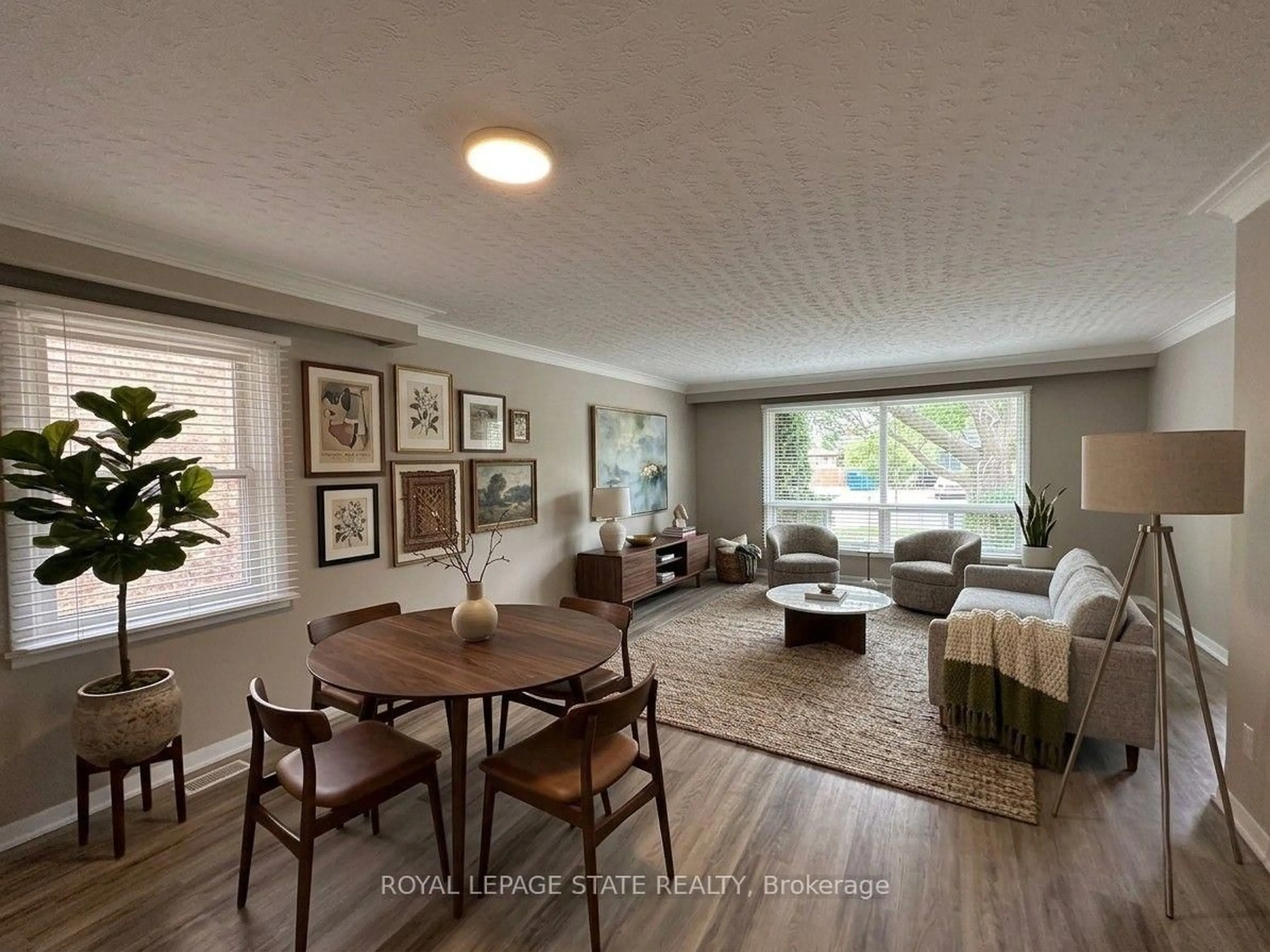 Living room with furniture, wood/laminate floor for 20 Lloyd Manor Rd, Toronto Ontario M9B 5H6