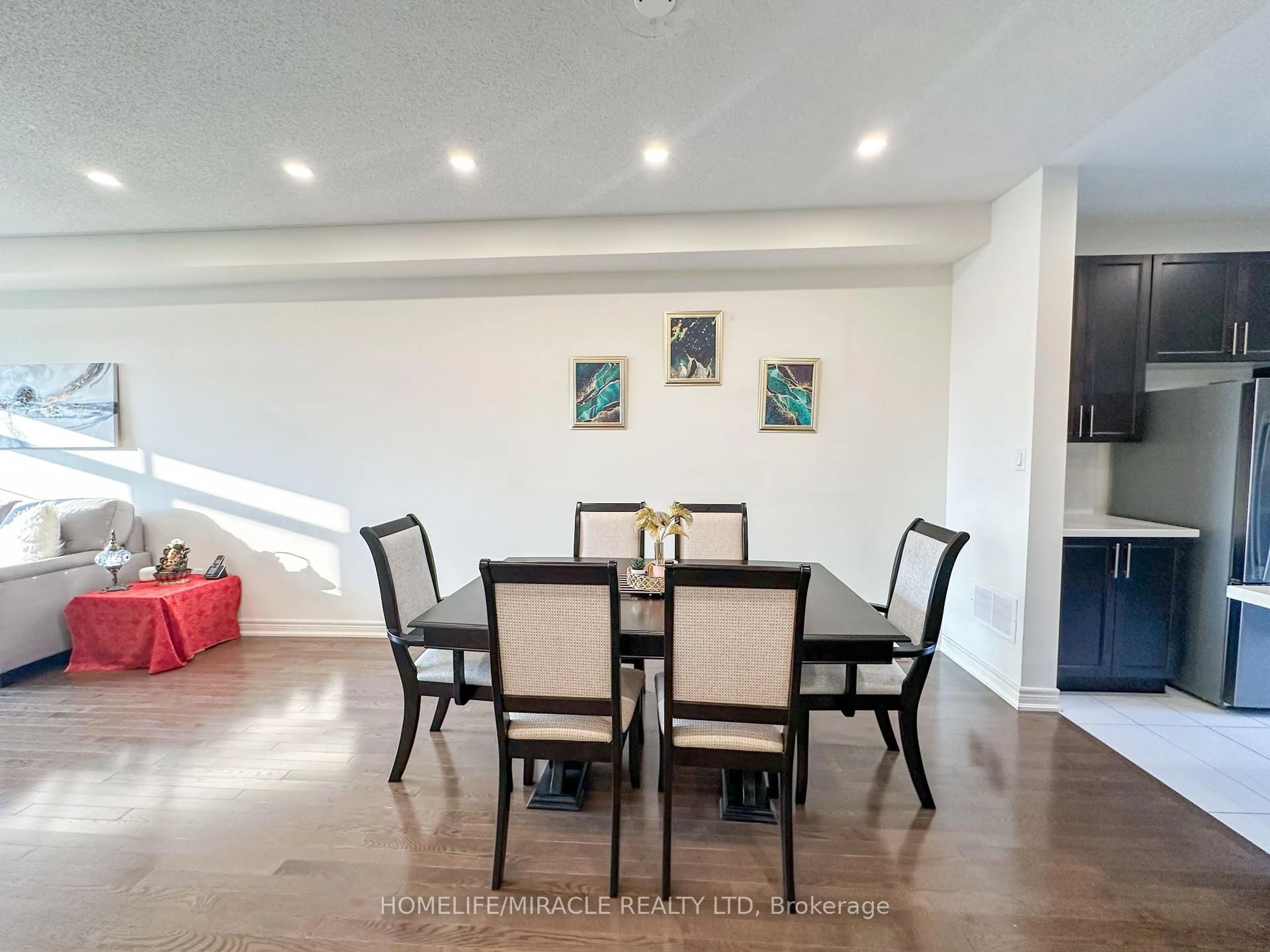 Dining room, wood/laminate floor for 58 Fruitvale Circ, Brampton Ontario L7A 5B8
