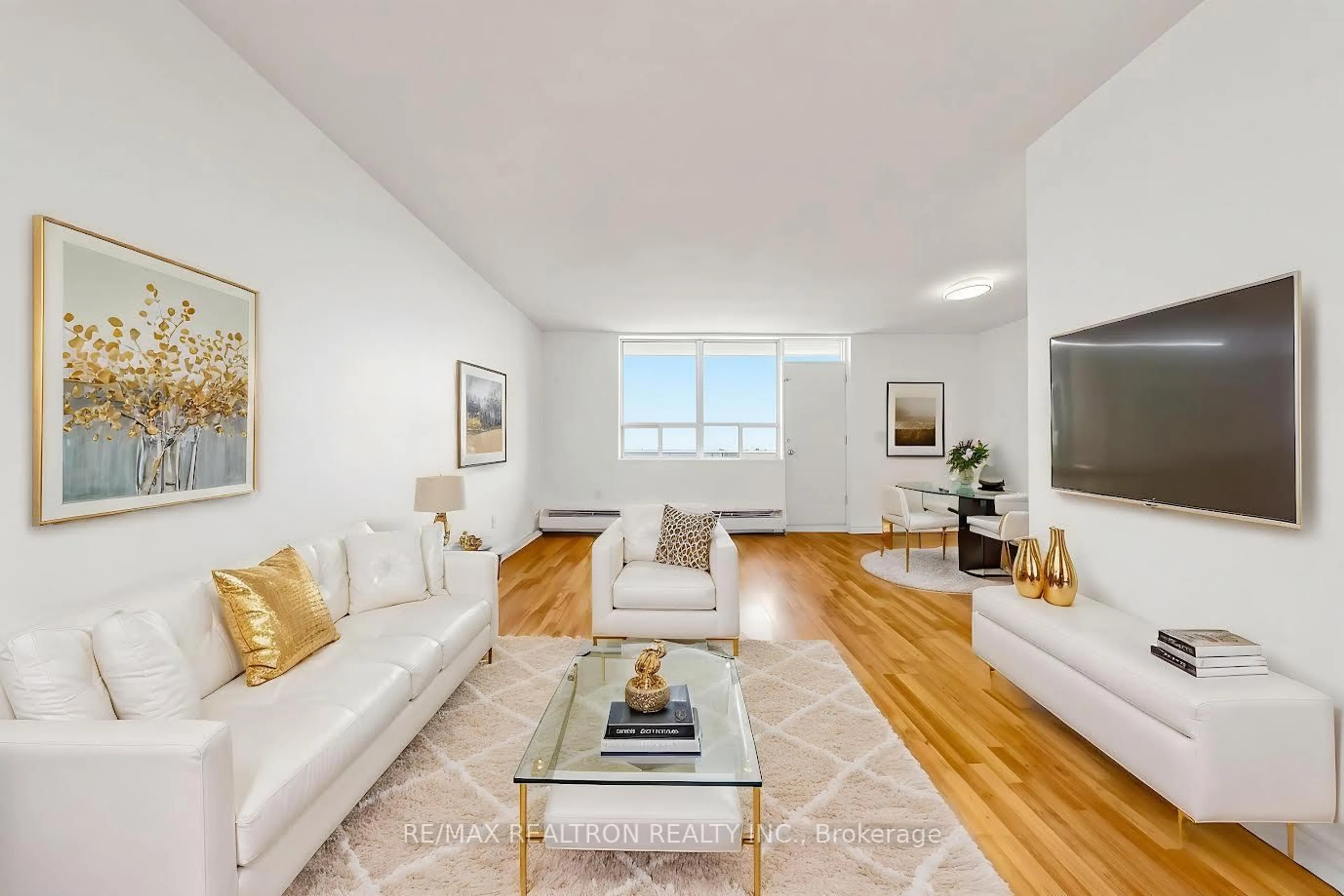Living room with furniture, unknown for 3145 Queen Frederica Dr #706, Mississauga Ontario L4Y 3A7