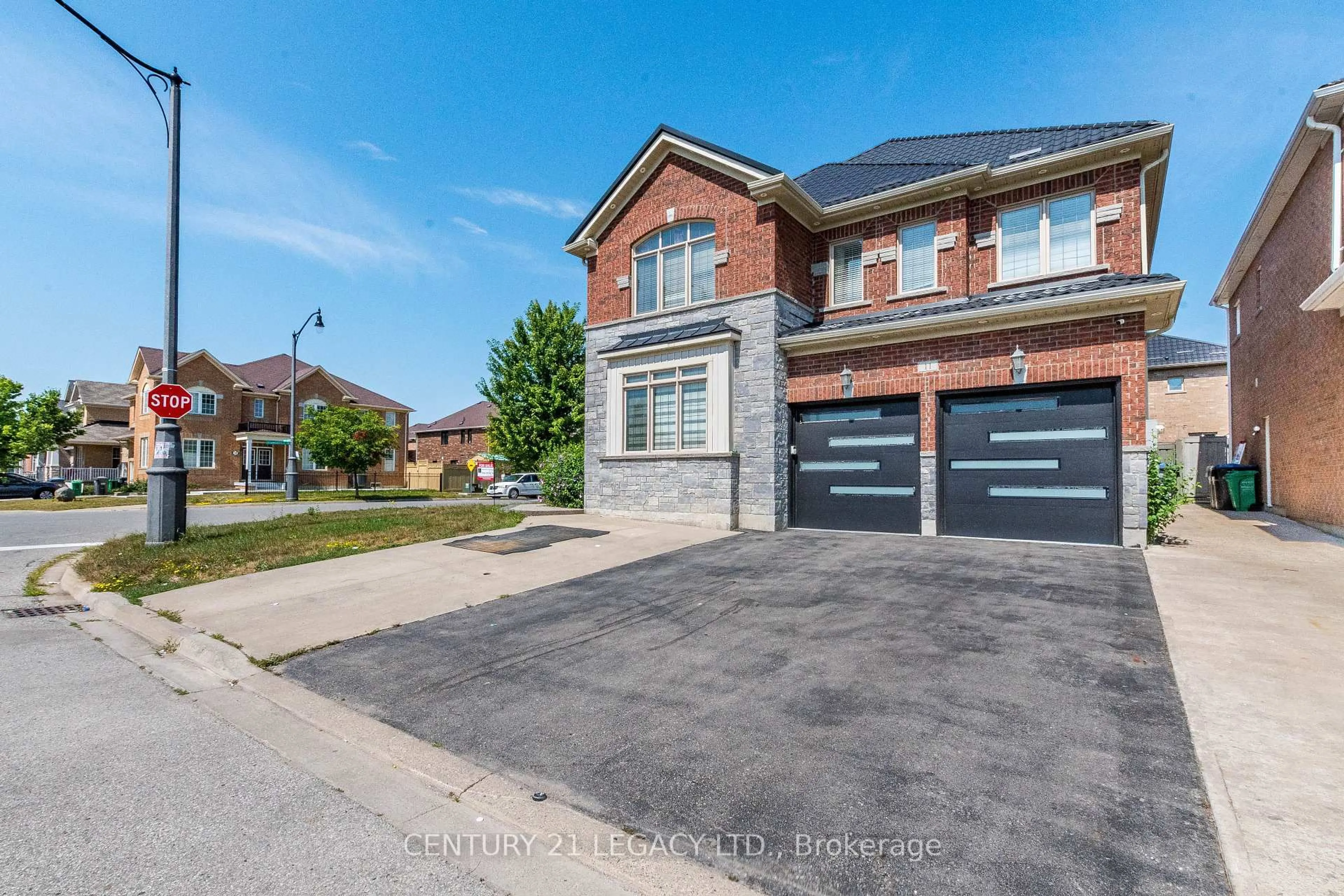 Home with brick exterior material, street for 11 DRUMMONDVILLE Dr, Brampton Ontario L6P 3M6