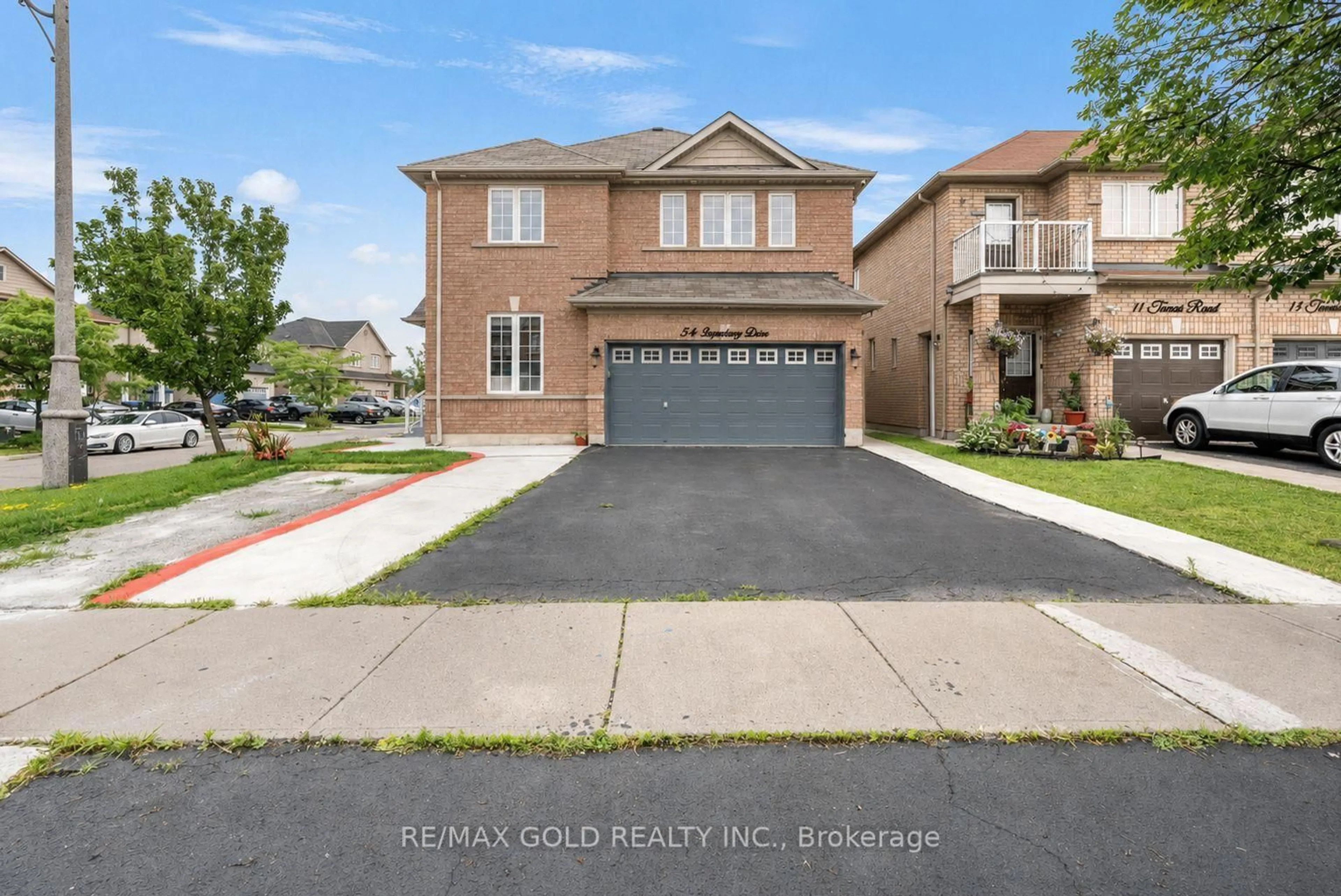 Home with brick exterior material, street for 54 Sugarberry Dr, Brampton Ontario L6X 0K3