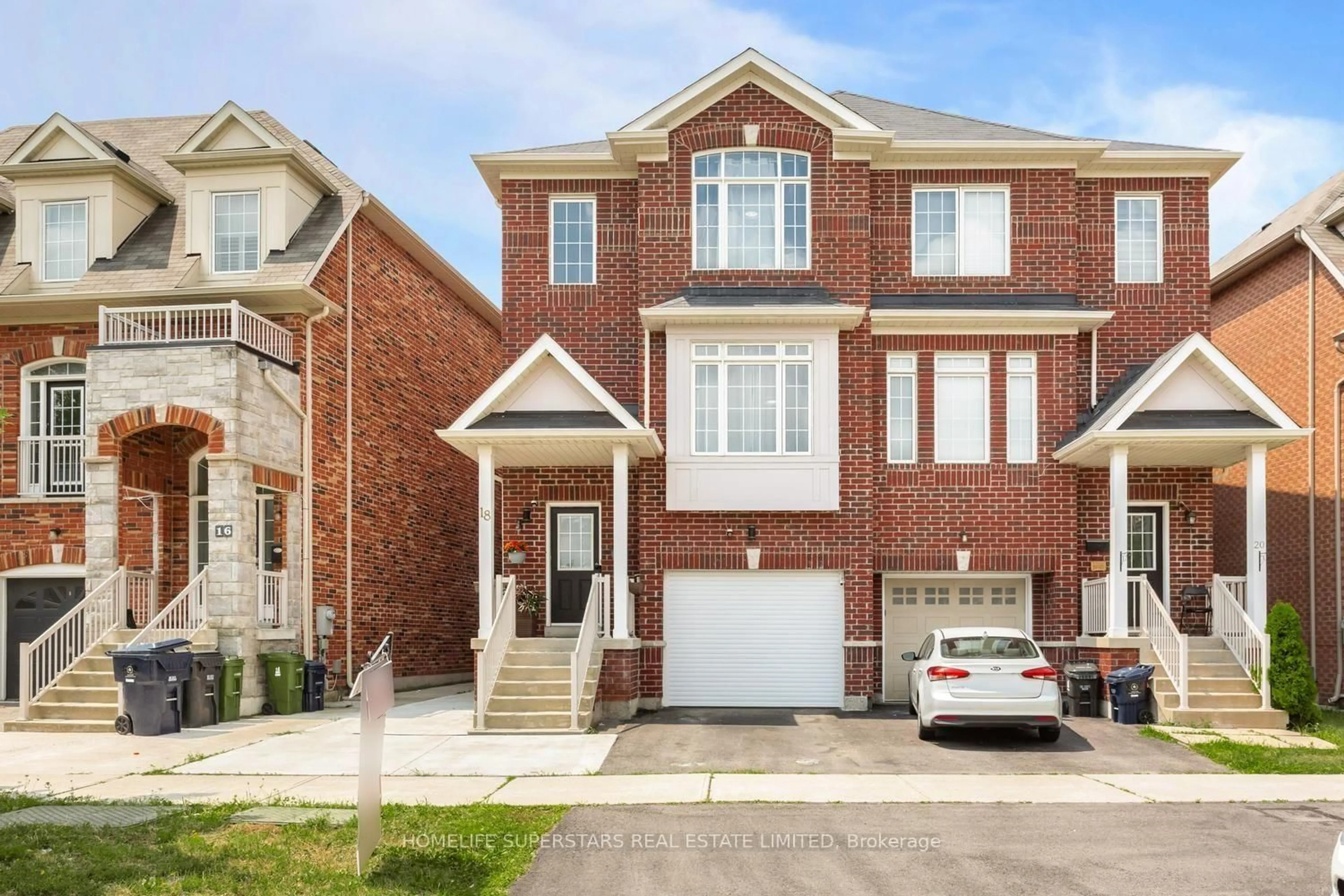 Home with brick exterior material, street for 18 Mary Chapman Blvd, Toronto Ontario M9M 0B2