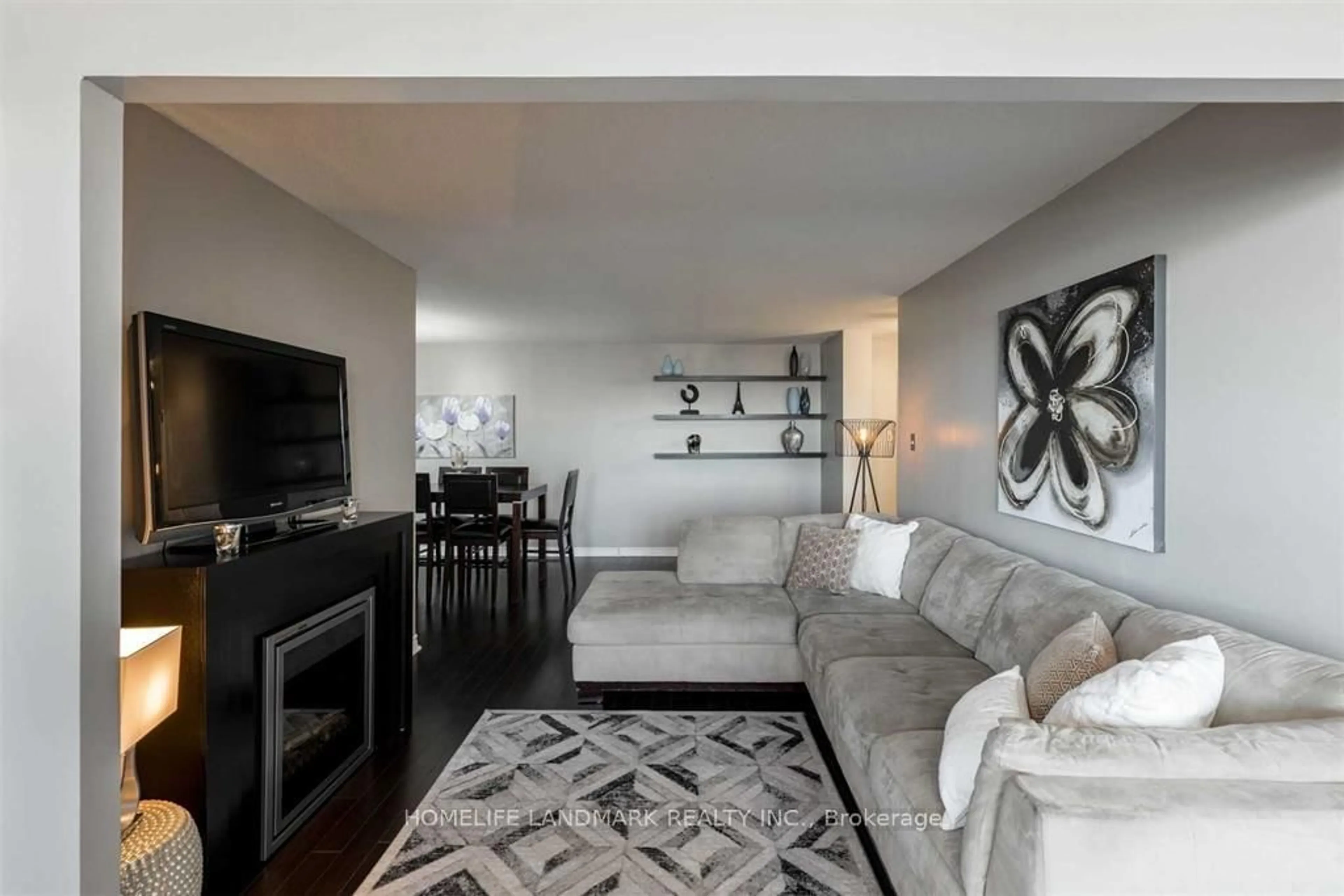 Living room with furniture, unknown for 100 County Court Blvd #707, Brampton Ontario L6W 3X1