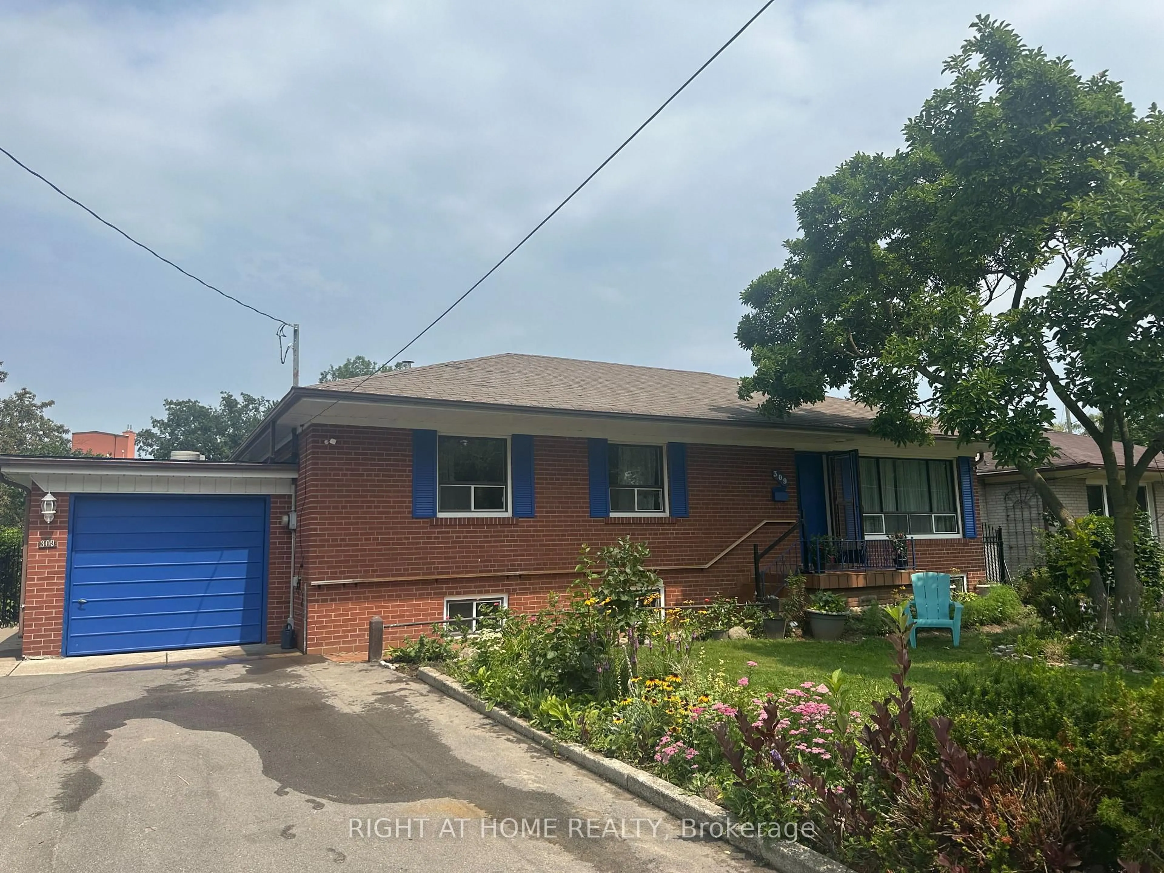 Home with brick exterior material, street for 309 Queen Mary Dr, Oakville Ontario L6K 3L5