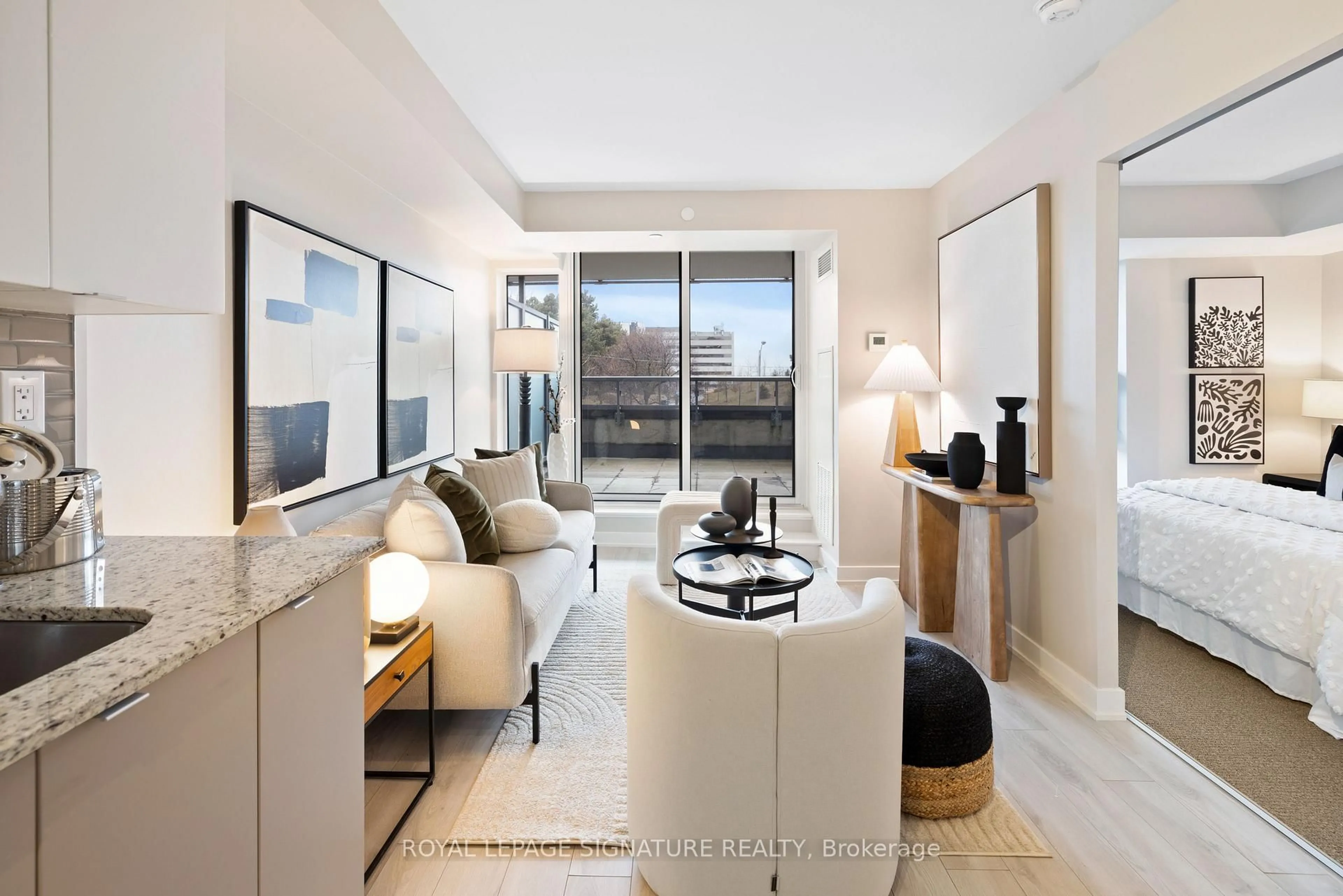 Living room with furniture, unknown for 160 Flemington Rd #312, Toronto Ontario M6A 0A9