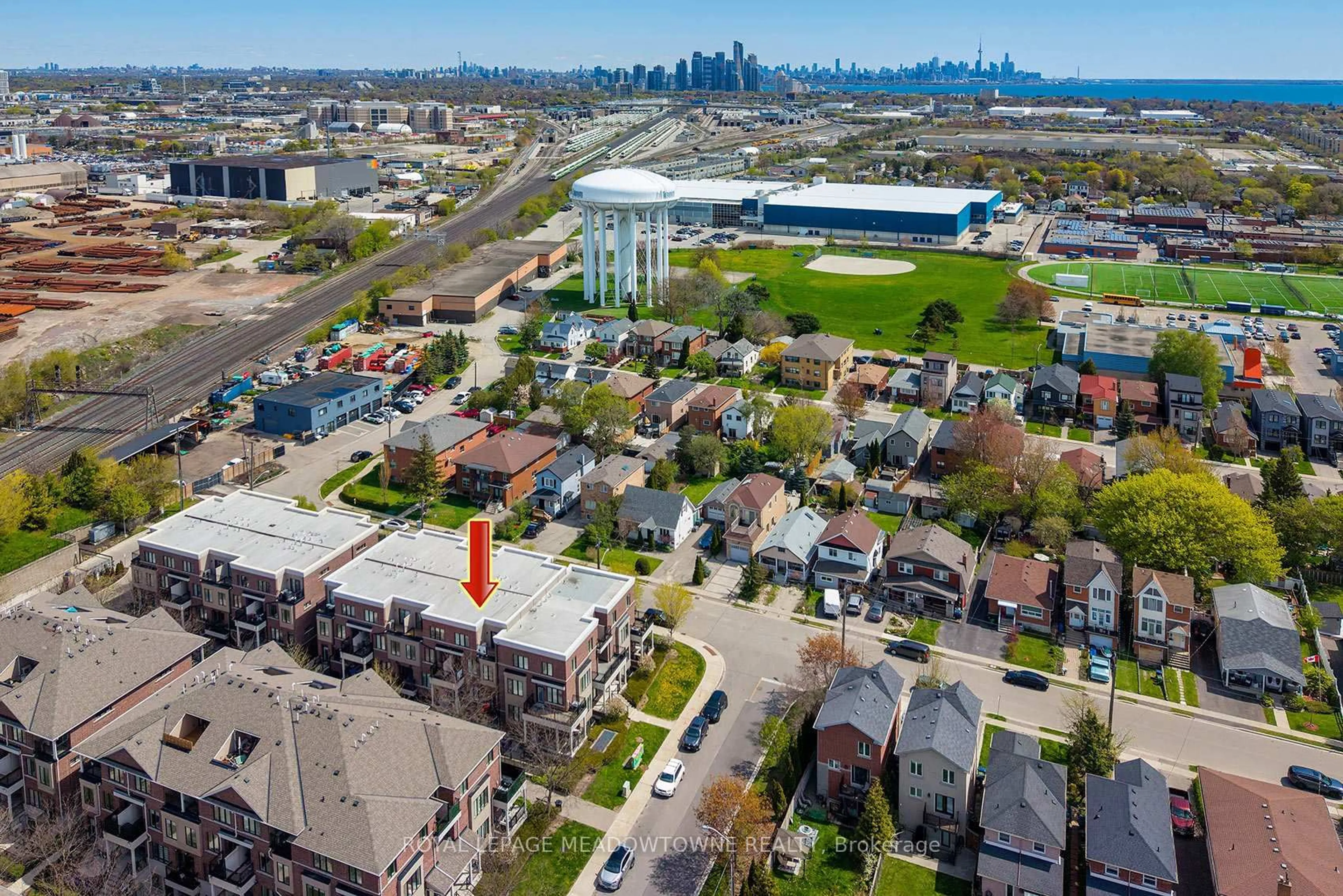 A pic from outside/outdoor area/front of a property/back of a property/a pic from drone, city buildings view from balcony for 10 Carnation Ave #19, Toronto Ontario M8V 0B8