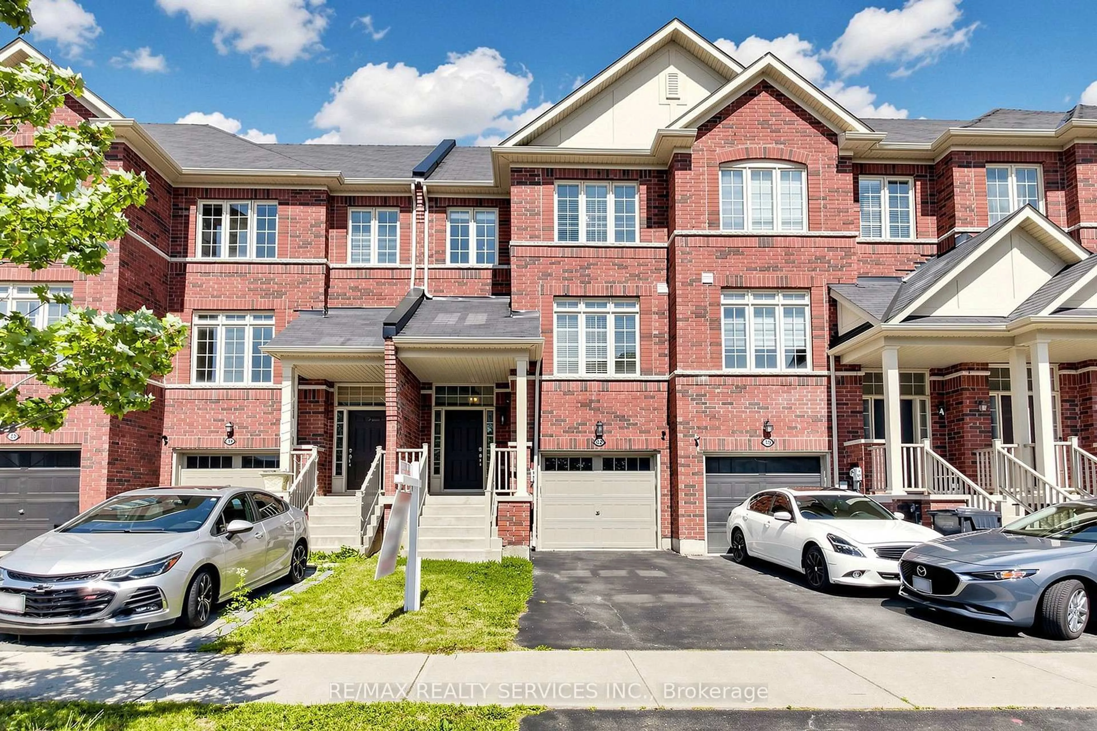 Home with brick exterior material, street for 32 Agava St, Brampton Ontario L7A 4S5