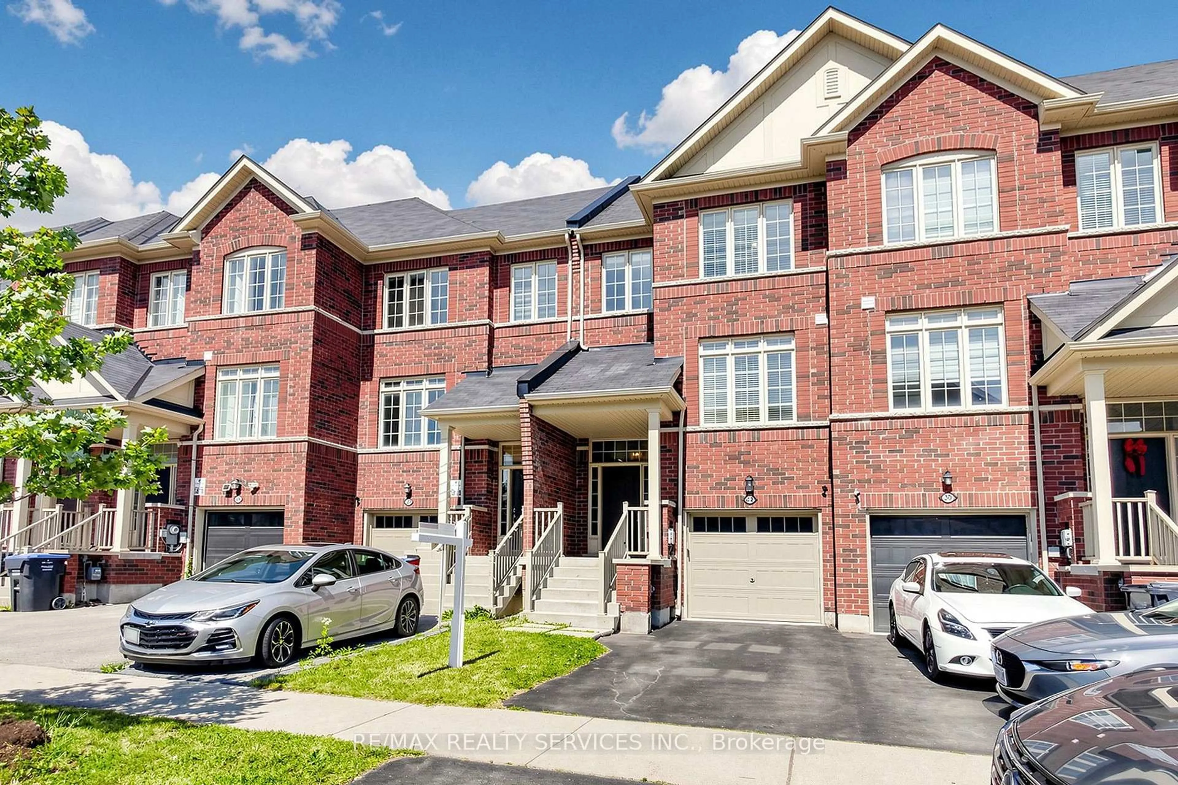 Home with brick exterior material, street for 32 Agava St, Brampton Ontario L7A 4S5