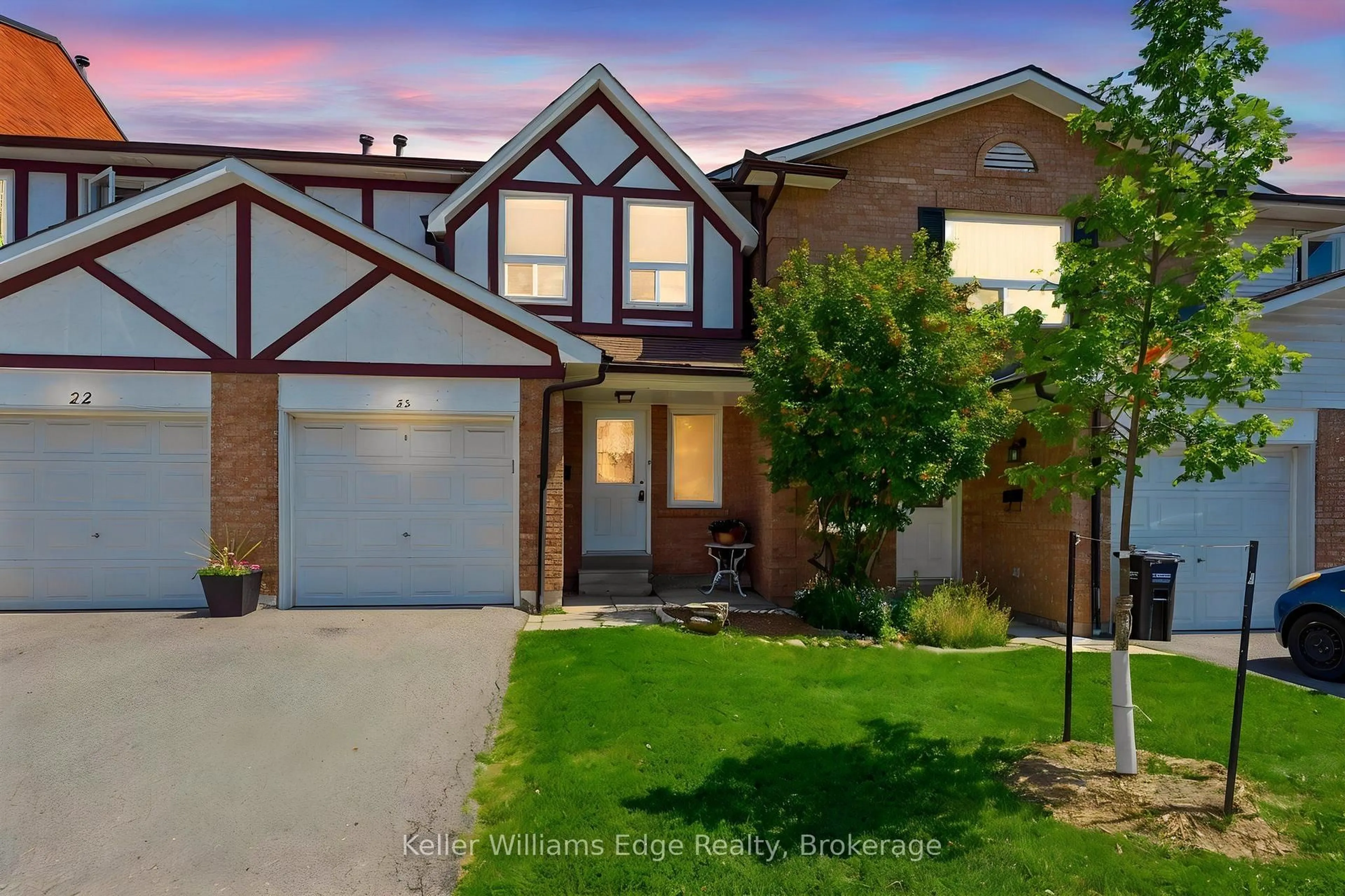 Home with brick exterior material, street for 333 Meadows Blvd #23, Mississauga Ontario L4Z 1G9
