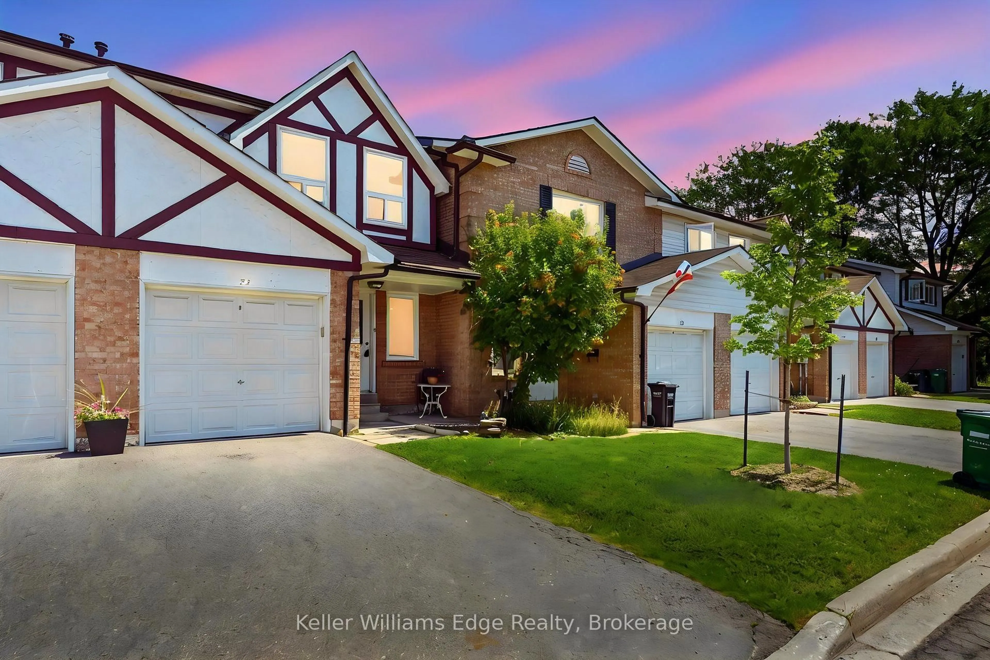 Home with vinyl exterior material, street for 333 Meadows Blvd #23, Mississauga Ontario L4Z 1G9