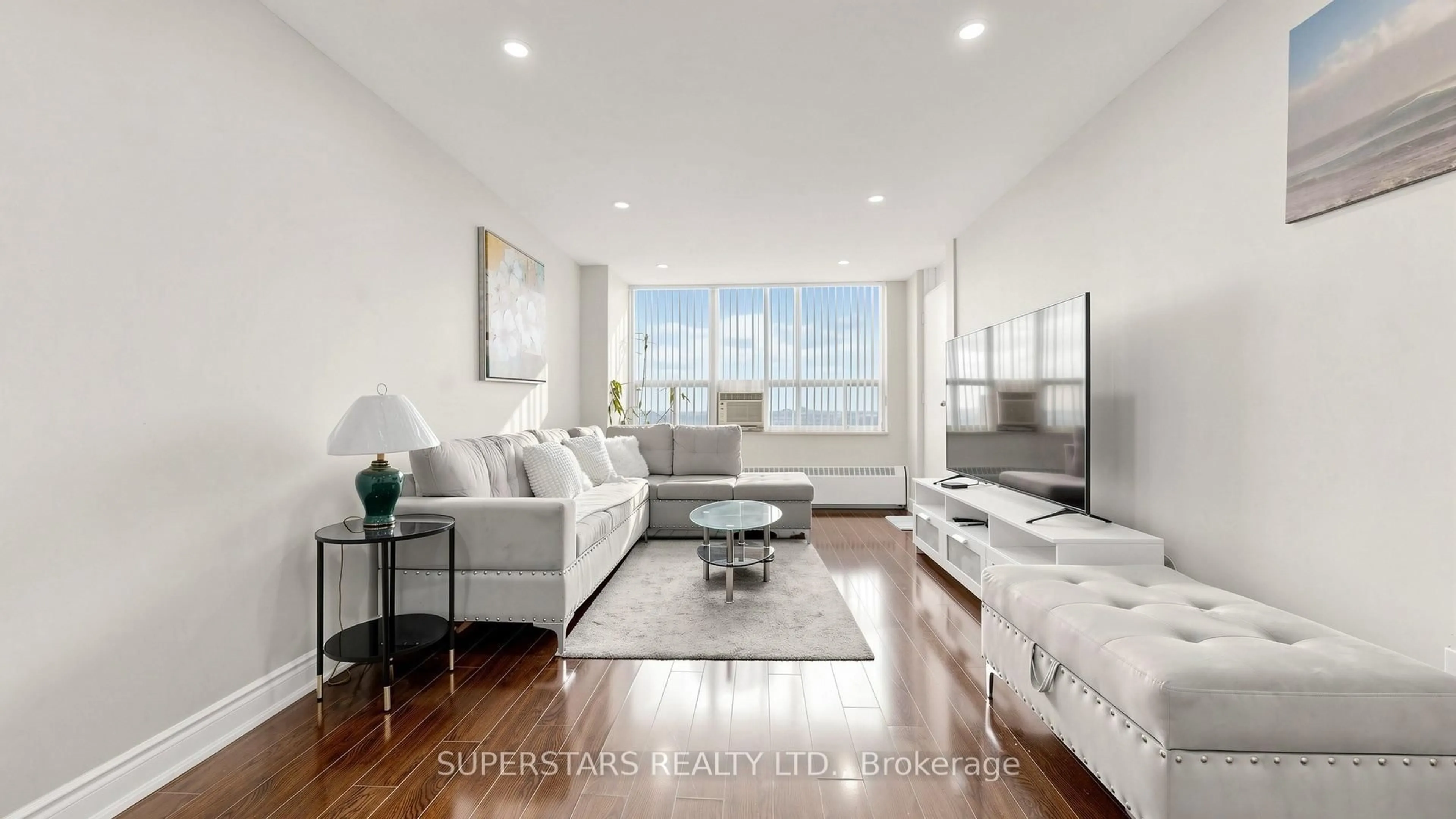 Living room with furniture, unknown for 390 Dixon Rd #1906, Toronto Ontario M9R 1T4